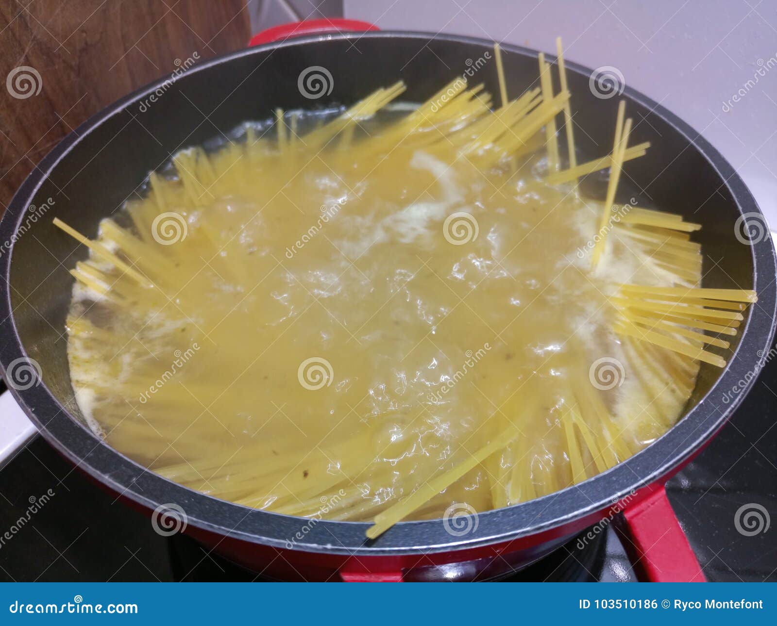 Fresh Raw Spaghetti Cooking in Boiling Hot Water Stock Photo Image of
