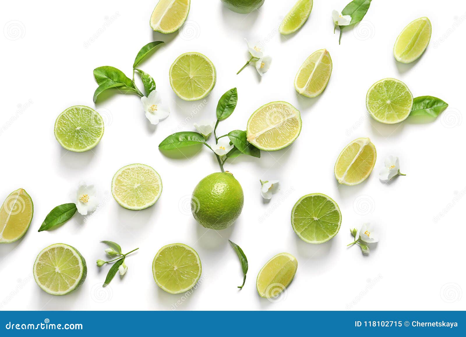 fresh ripe green limes on white background, top view