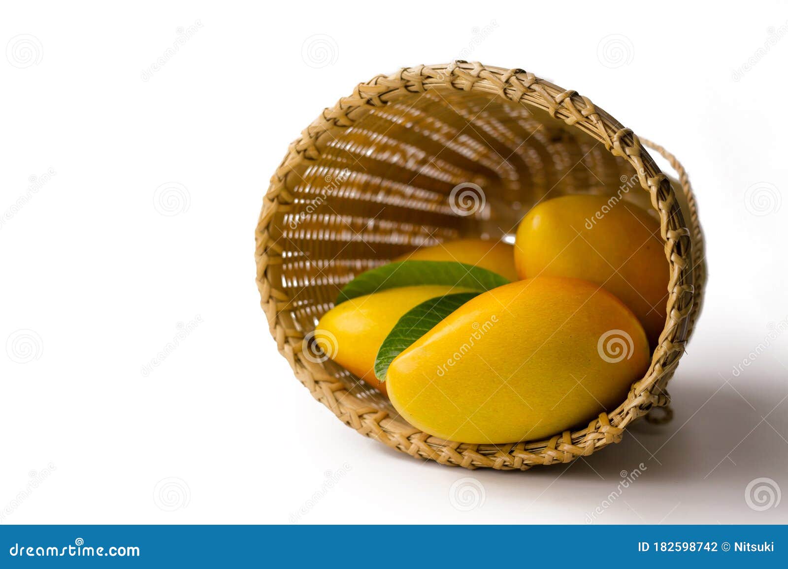 fresh ripe mango in basket  whtie background