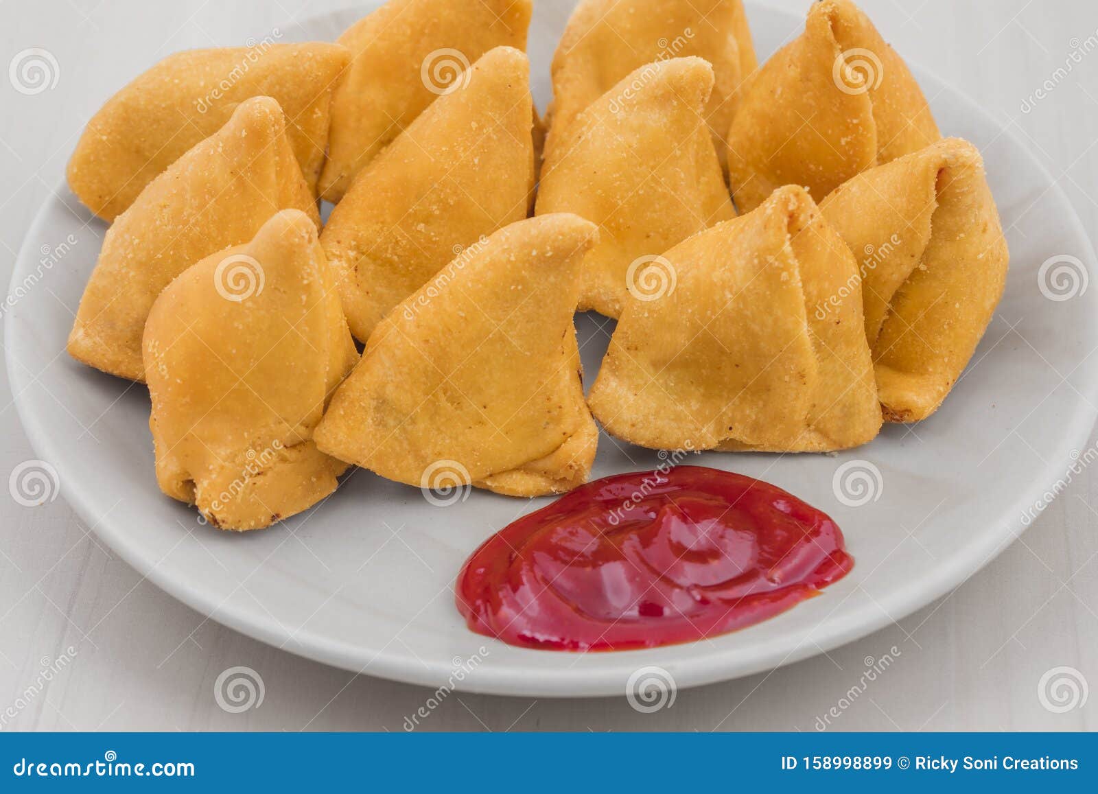 Samosa Deep Fried Pastry Snack In Hot Oil - Indian Or African Cuisine