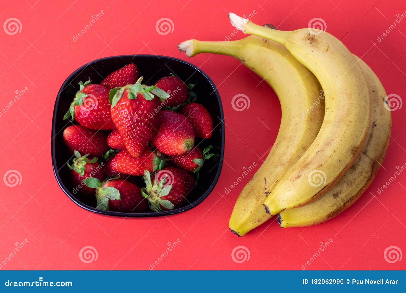Fresh Strawberries and Bananas on Red Background Stock Photo Image of