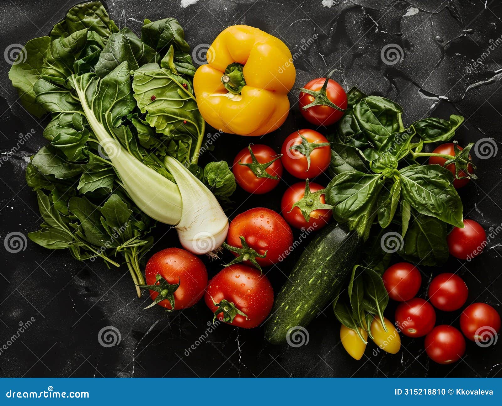 fresh summer vegetables flatlay on green background. salad romano, tomatoes, yellow pepper, basil, arugola, cucumber