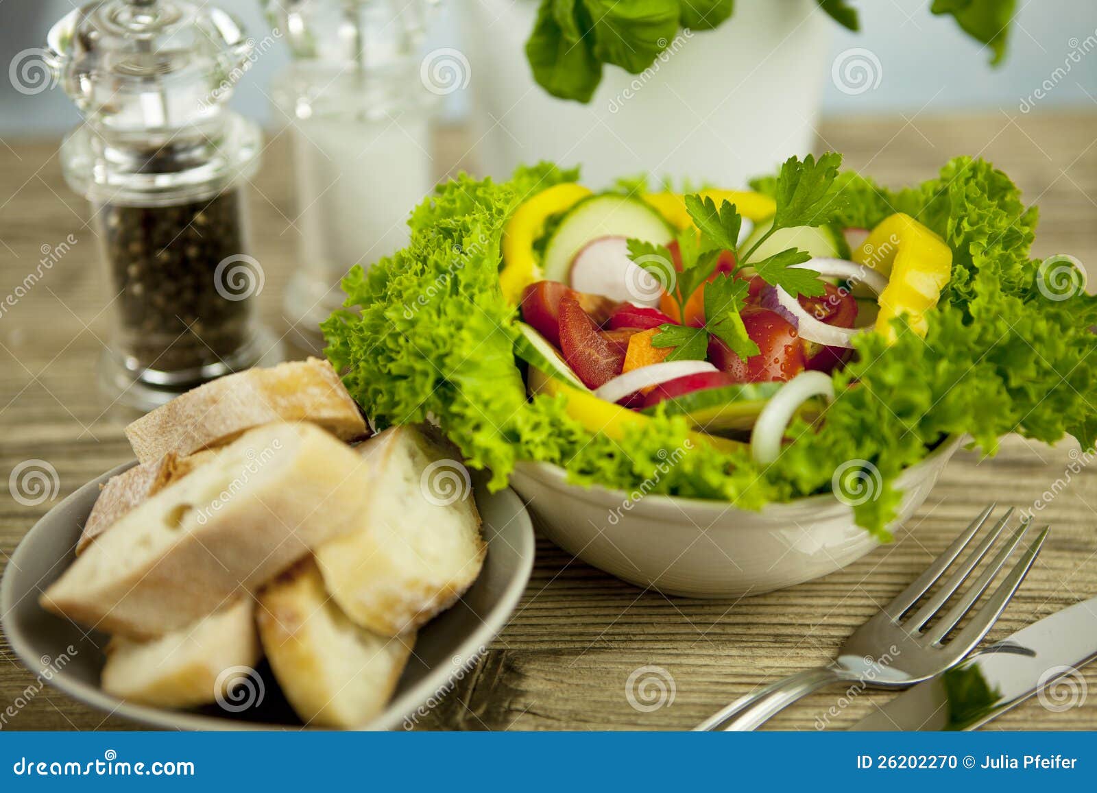 Fresh Tasty Healthy Mixed Salad and Bread on Table Stock Photo - Image ...