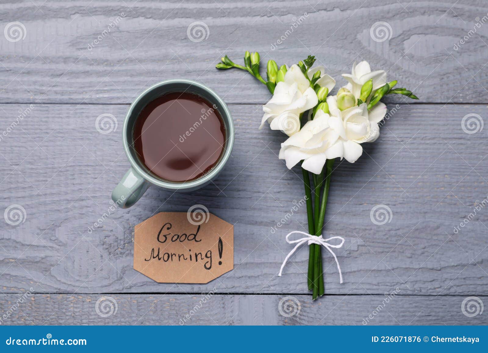 Fresh Tea, Flowers and Good Morning! Message on Grey Wooden Table ...