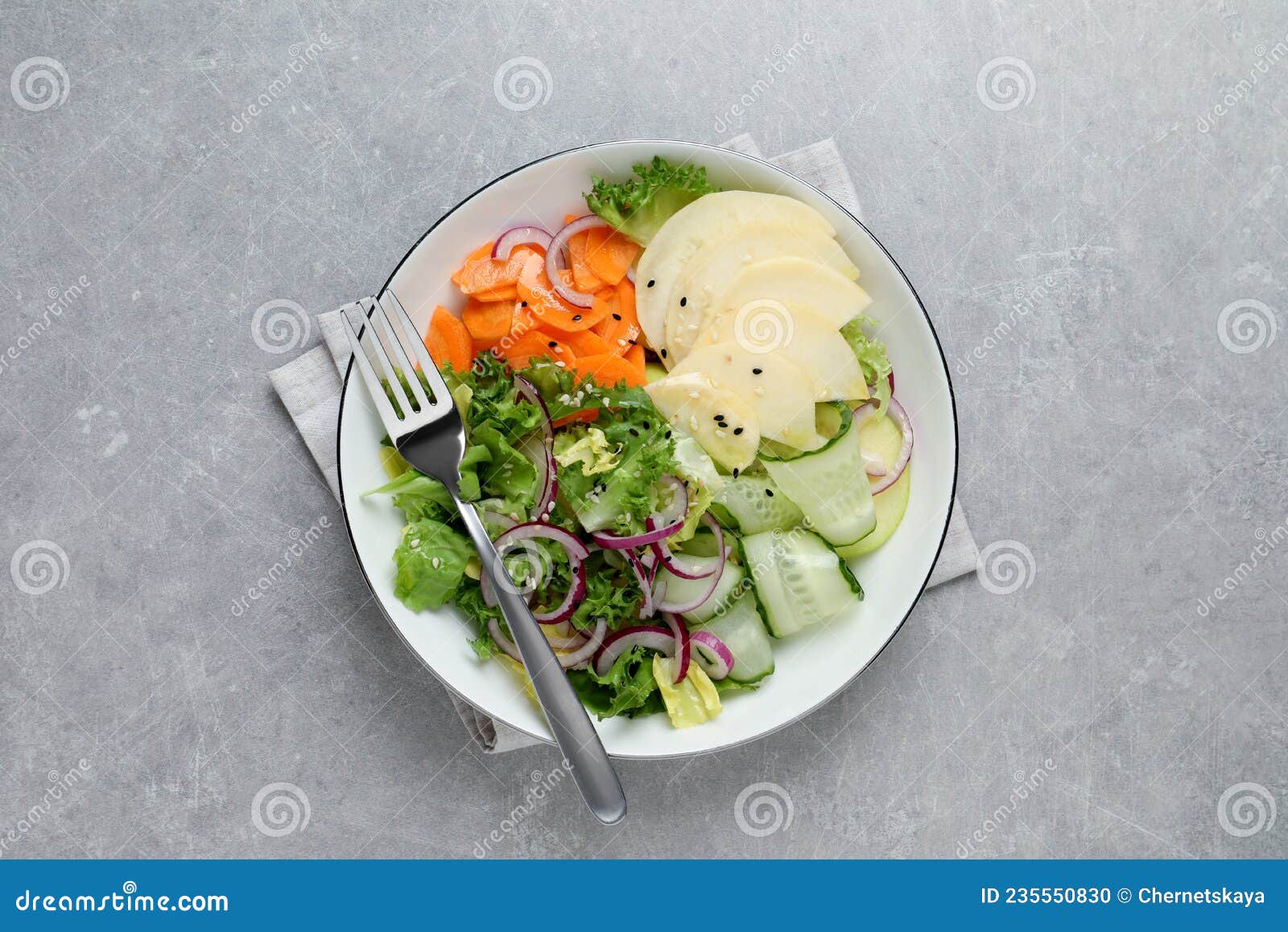 Fresh Turnip Salad in Bowl on Grey Table, Top View Stock Photo Image