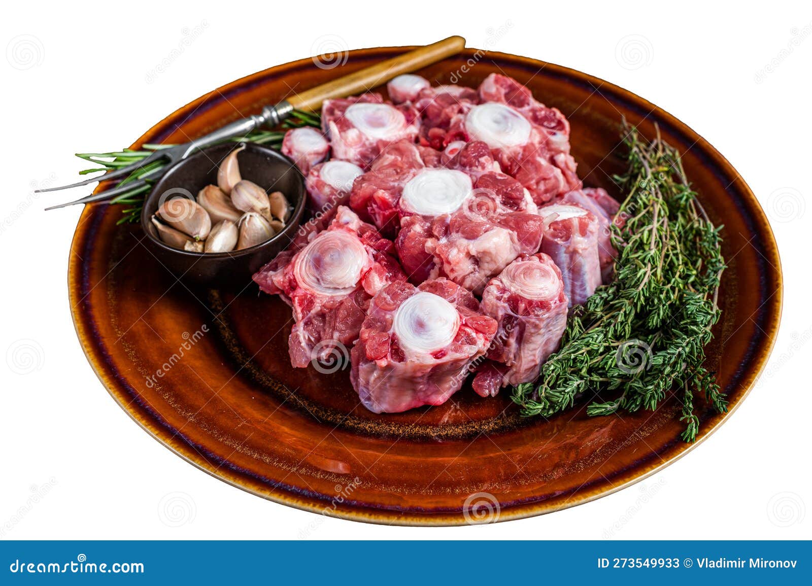Fresh Uncooked Beef Oxtail Cut Meat on Rustic Plate with Herbs