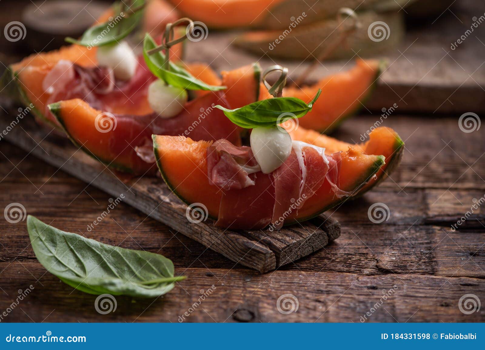 Fresh Water Melon with Parma Ham, Basil and Cherry Mozzarella Stock