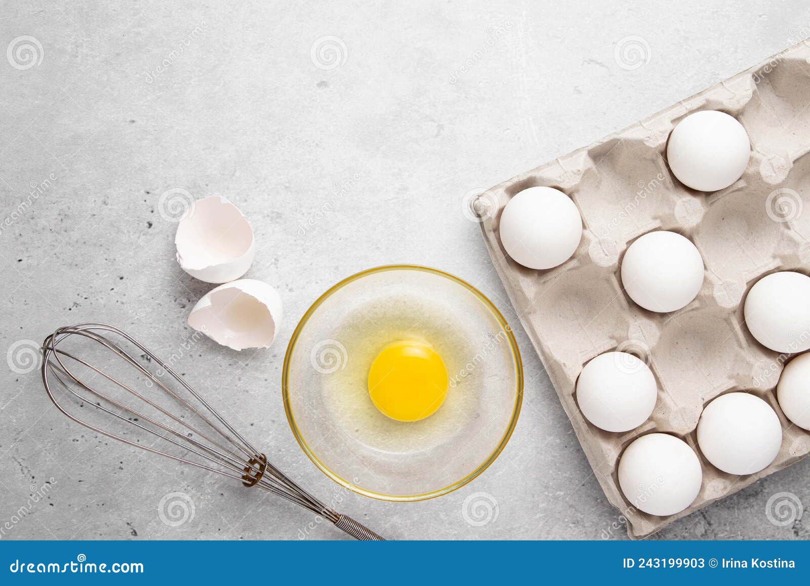 Fresh White Organic Chicken Eggs in Paper Tray, Broken Egg and Shell, Whisk on Light Background