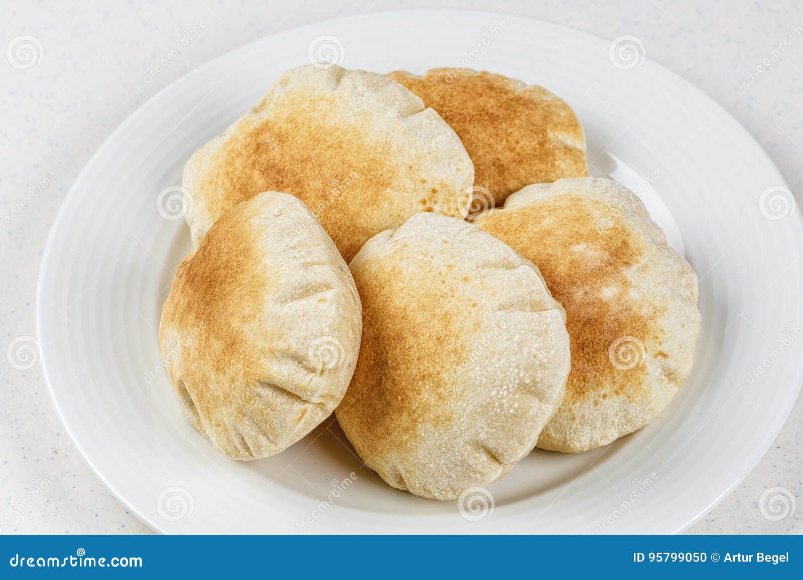 freshly baked arabic bread batbout