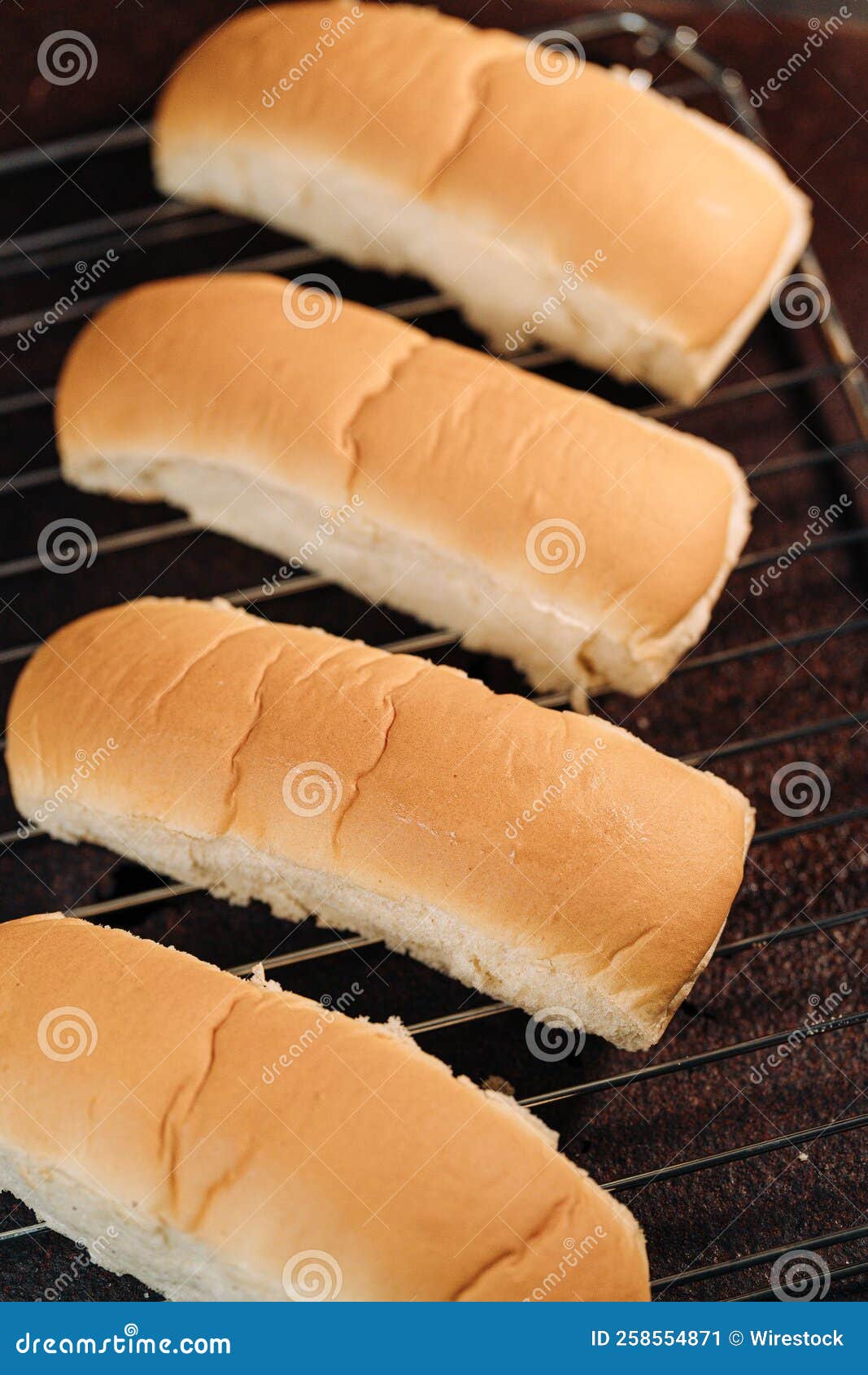 Freshly baked hot dog buns stock image. Image of nutrition 258554871