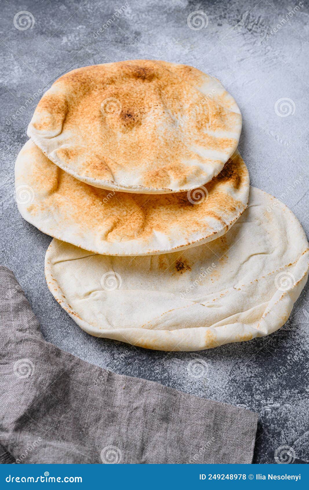 Freshly Baked Pita Bread Set, on Gray Stone Table Background Stock
