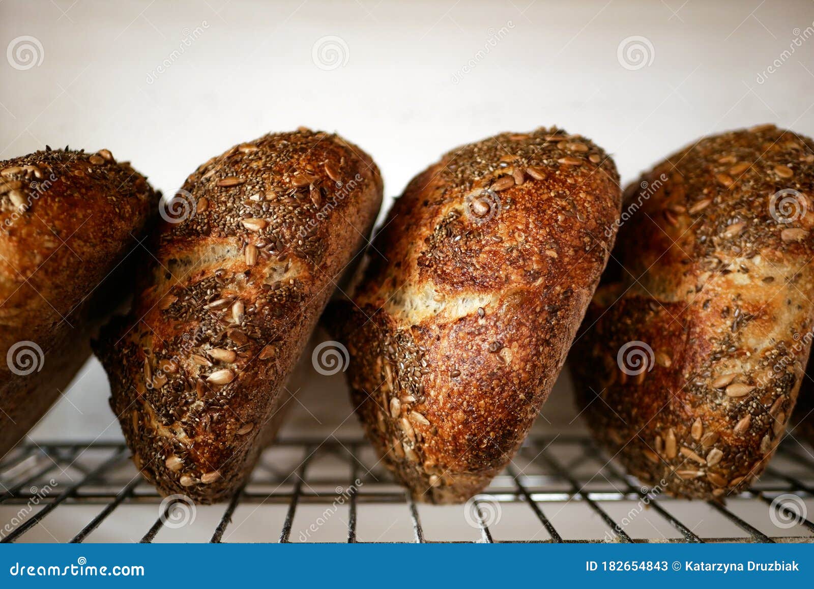 freshly baked sour dough bread loafs left to cool down at the artesanal bakery.