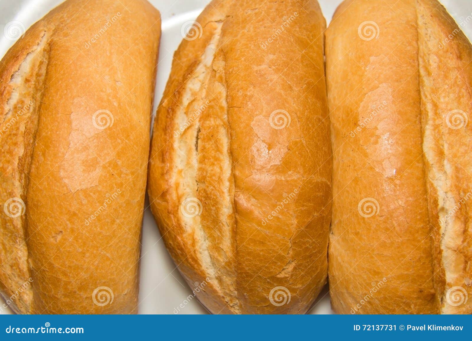 Freshly baked white bread stock image. Image of traditional 72137731
