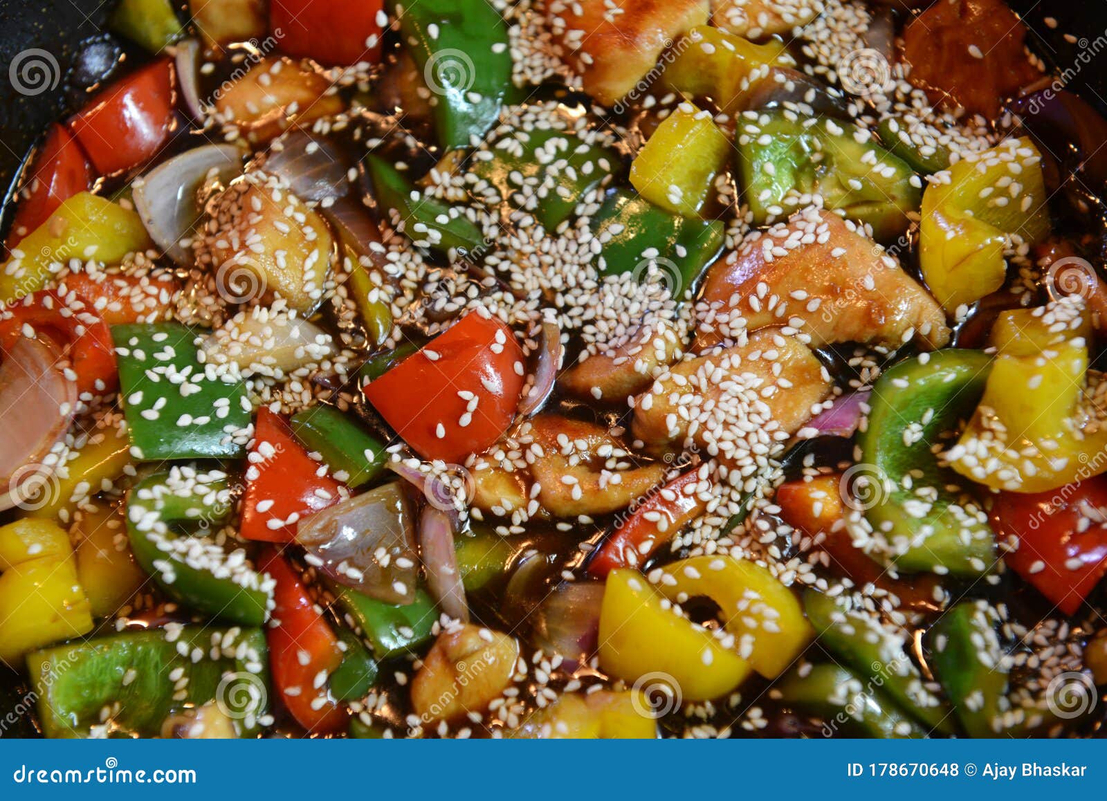 Freshly Prepared Stir Fry with Chicken and Vegetables in a Wok Stock