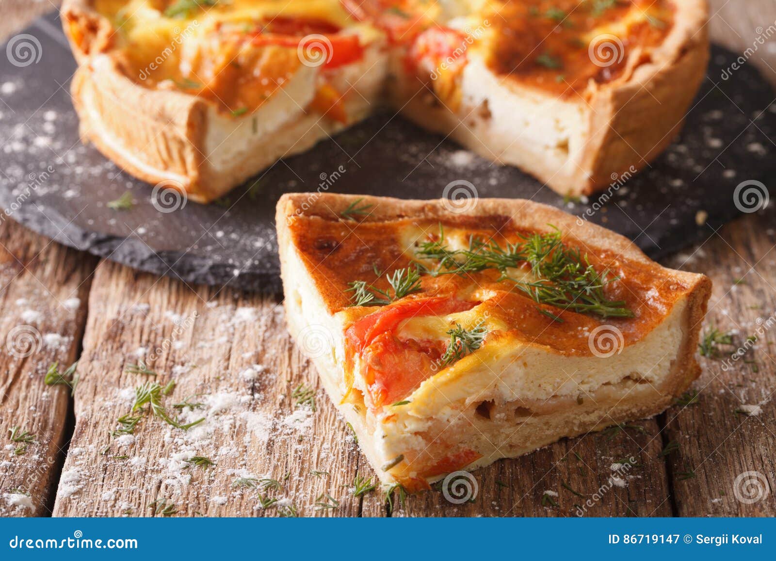 Freshly Sliced Pie with Feta, Tomatoes and Herbs Closeup. Horizontal ...