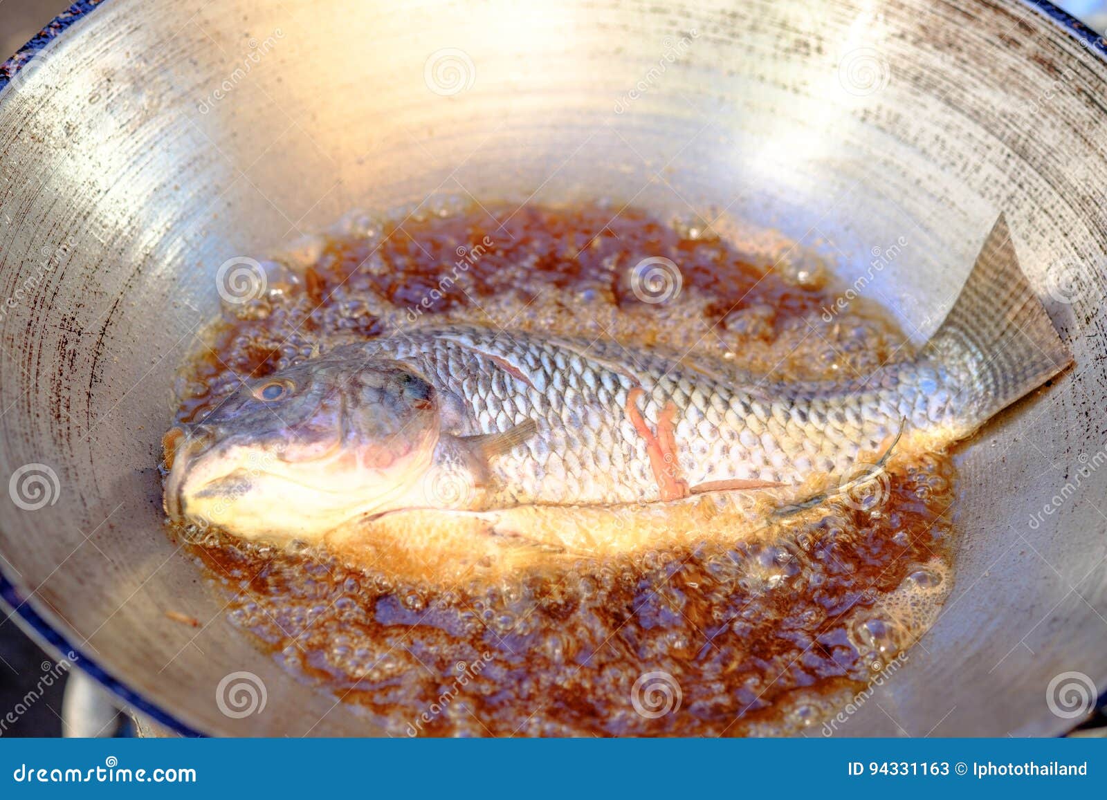 Freshwater Fish Tilapia Fried in a Pan and Boil Oil Stock Image Image