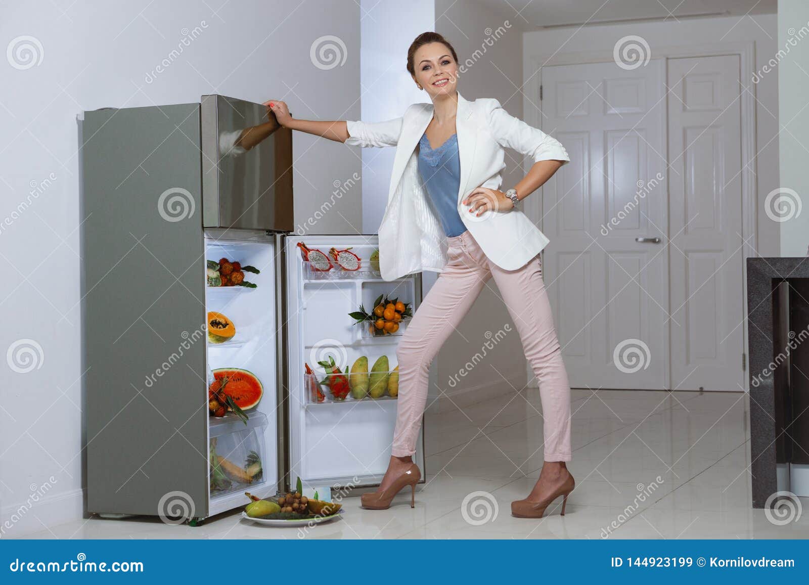 Fridge stock image. Image of model, attractive, adult 144923199
