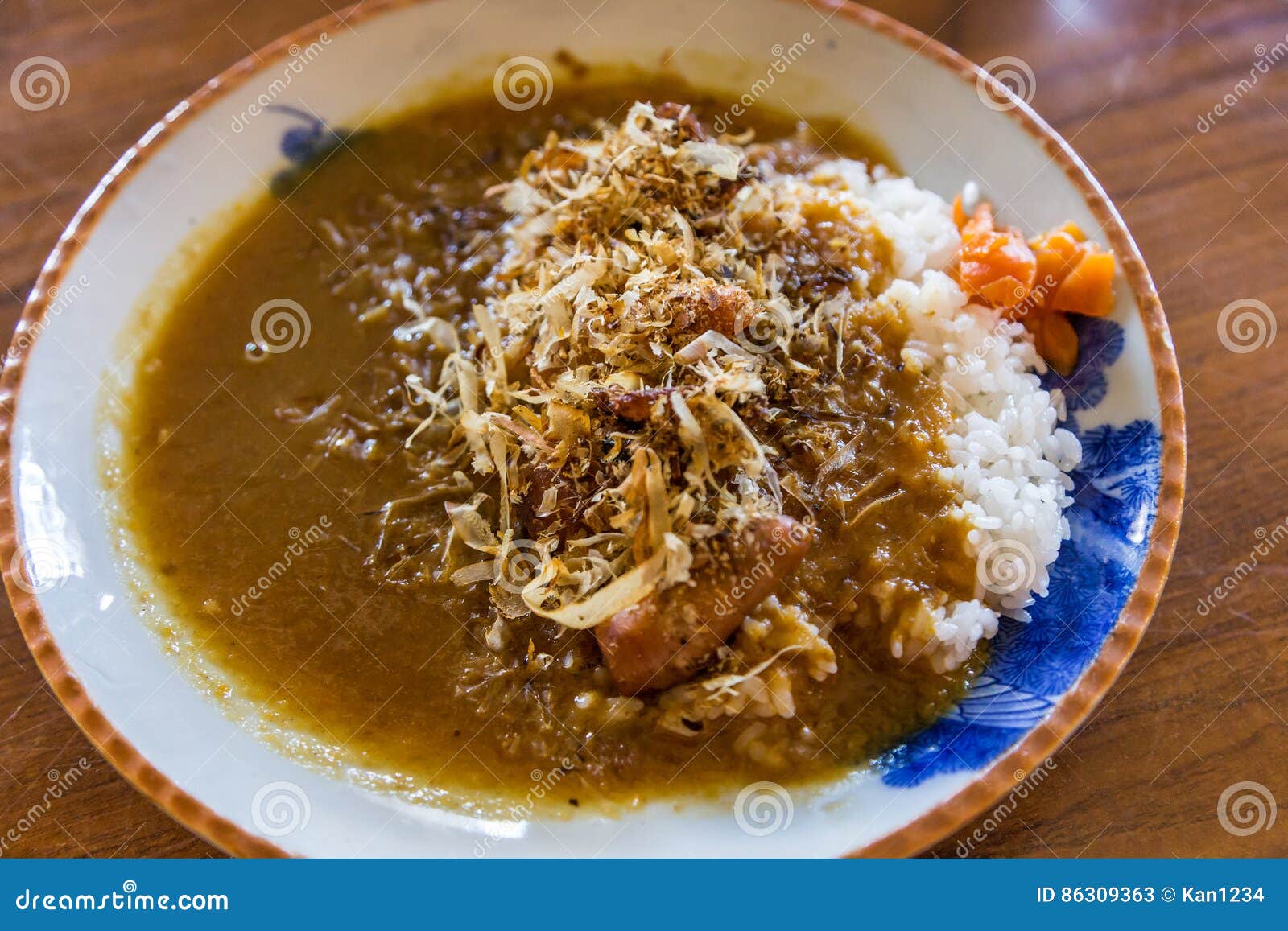 Fried Baby Octopus Curry Rice and Dried Fish. Stock Image Image of