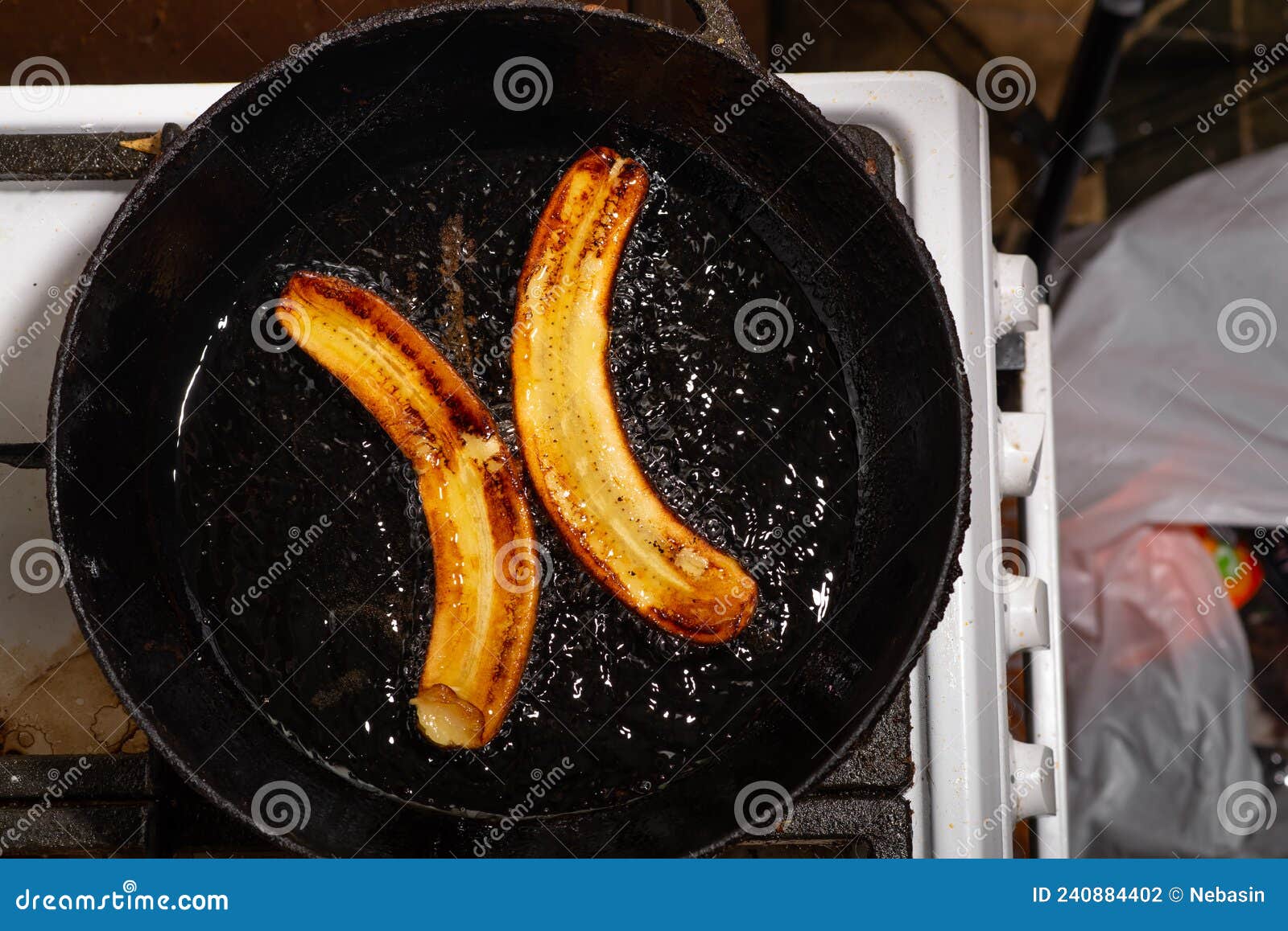 Fried Bananas in a Pan. Raw Bananas Boiled in Oil Stock Photo Image of asian, recipe 240884402