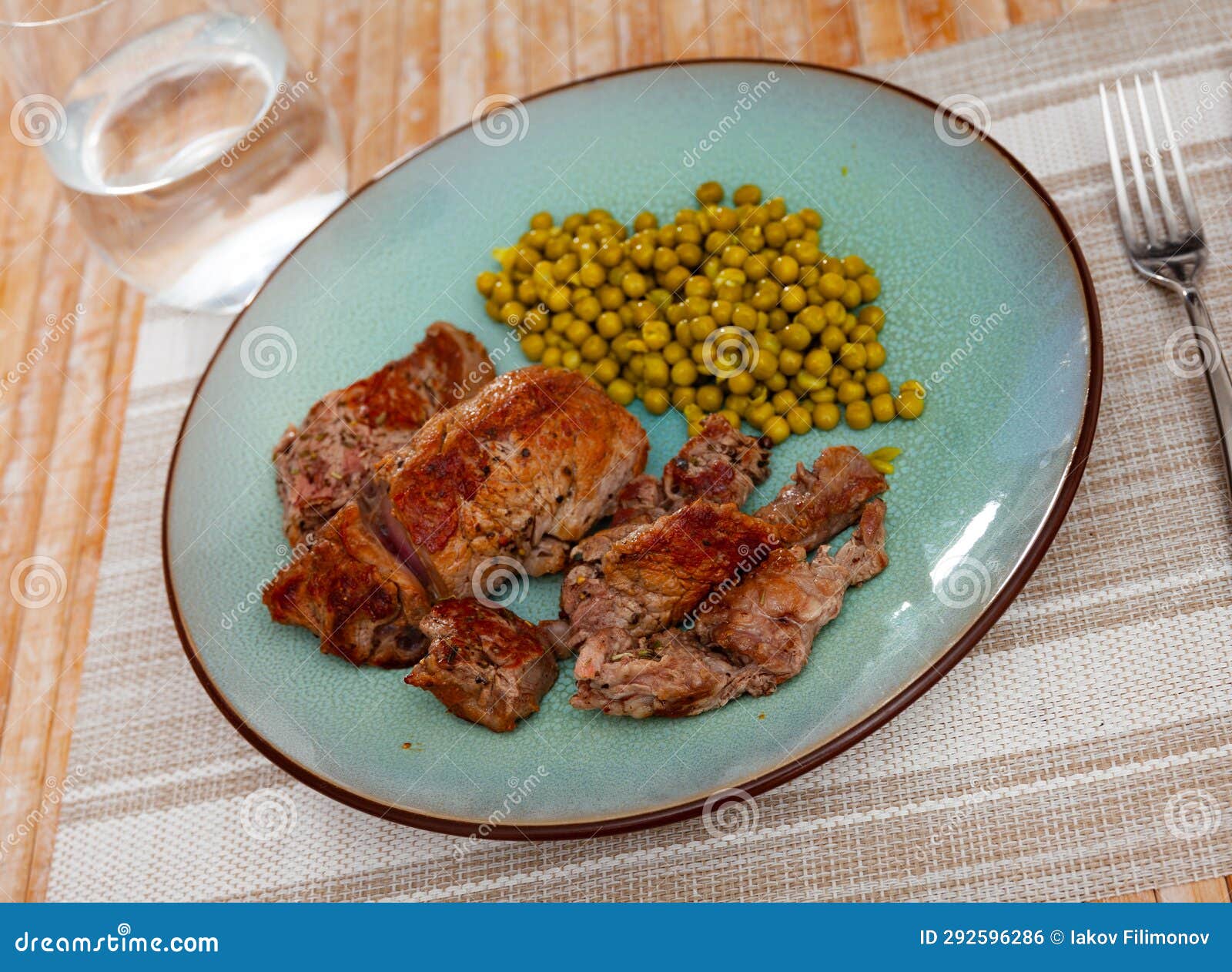 Fried Beef Cutlet with Green Peas on Plate Stock Photo Image of steak