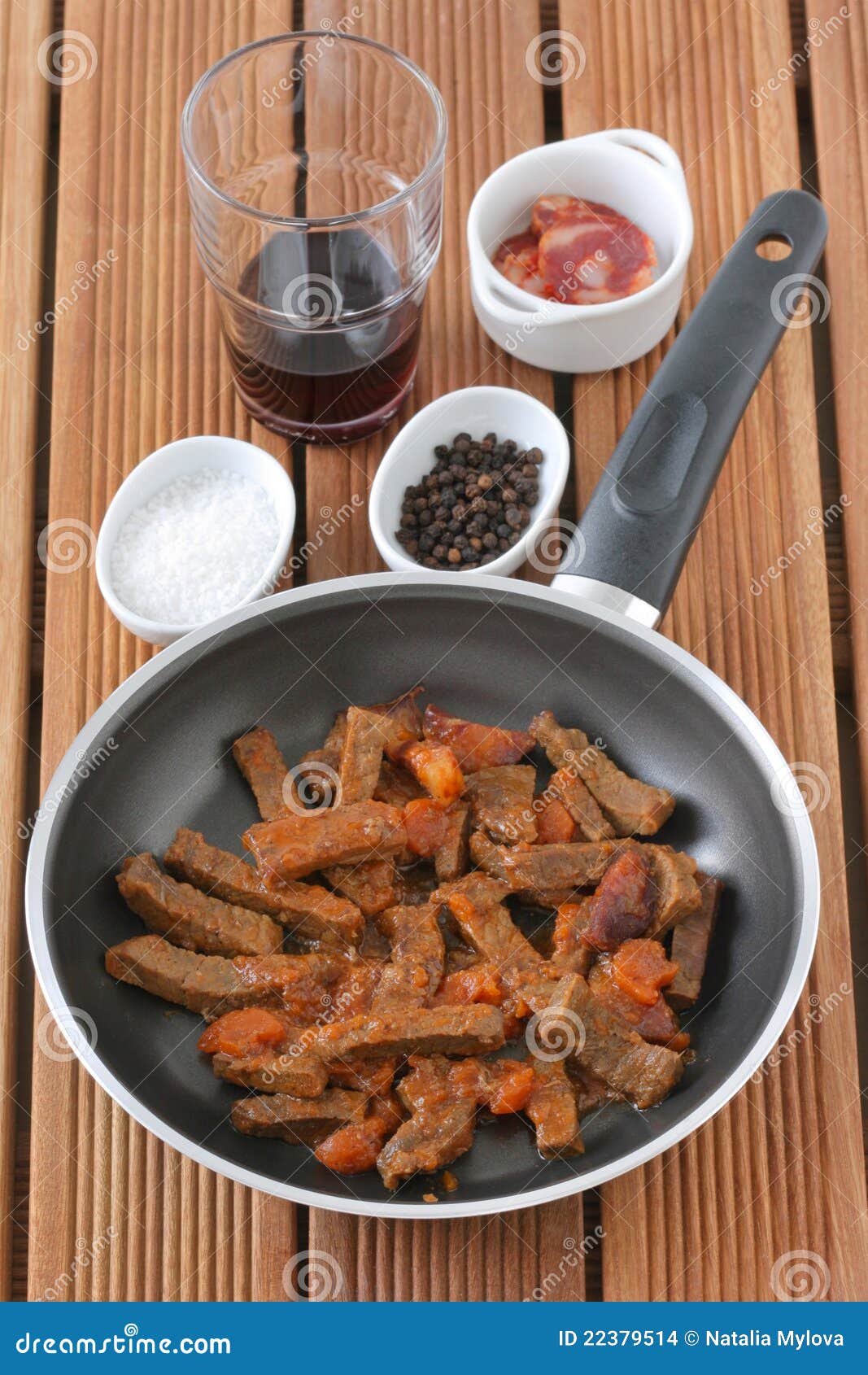 Fried beef with sausages stock photo. Image of salt, bowl 22379514