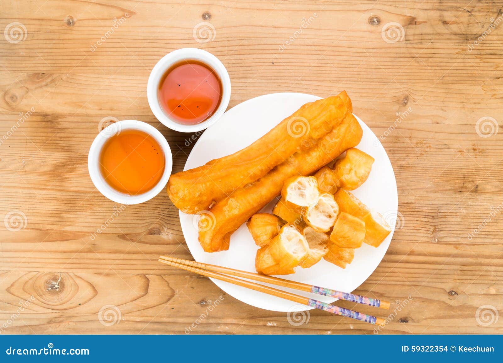 fried bread stick or you tiao served with chinese tea.