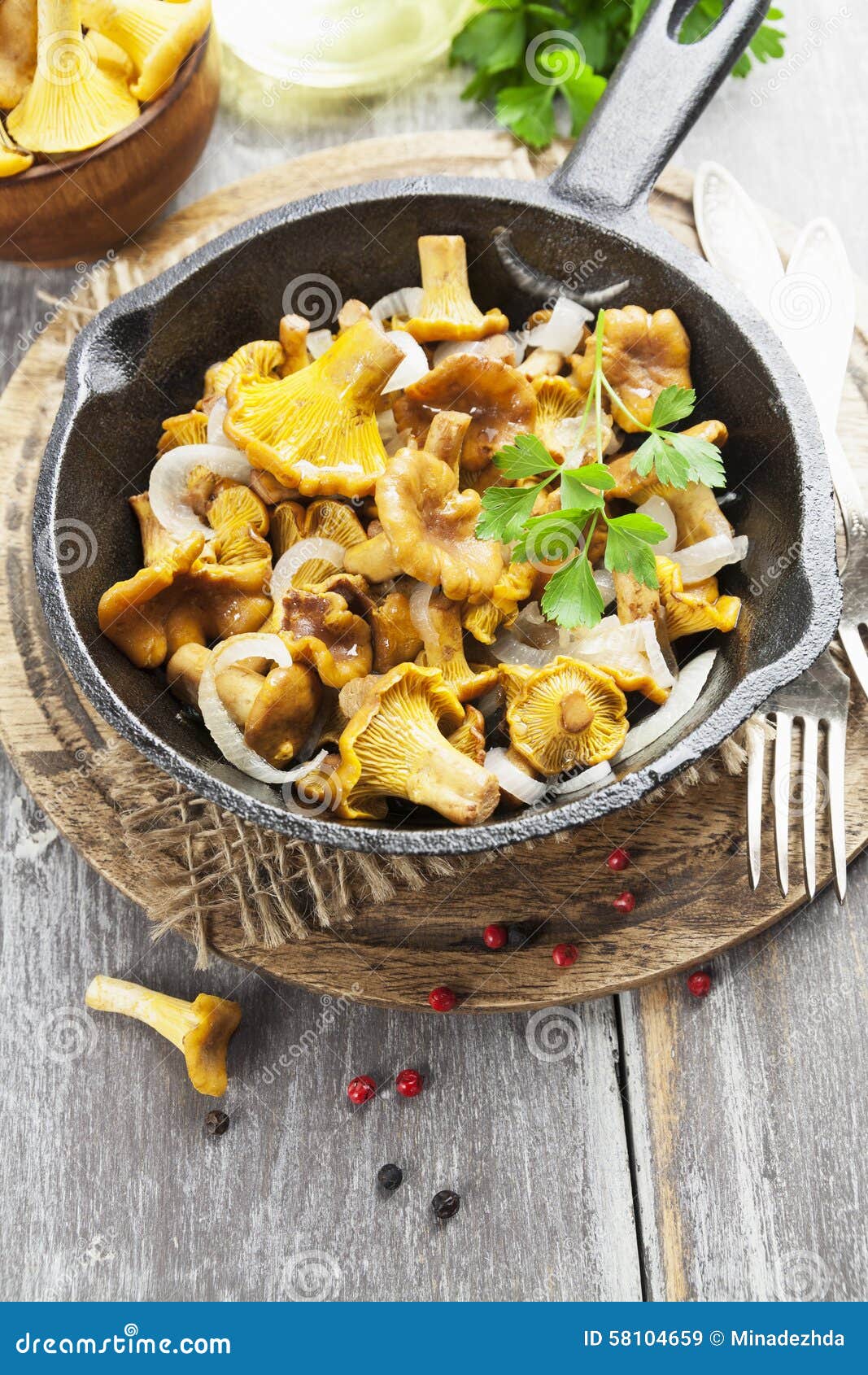 Fried chanterelles stock image. Image of roasted, herbs 58104659