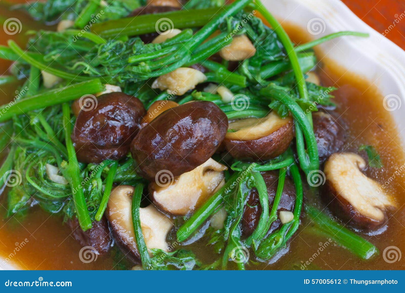 Fried Chayote Vegetable in Oyster Sauce with Shiitake Stock Photo