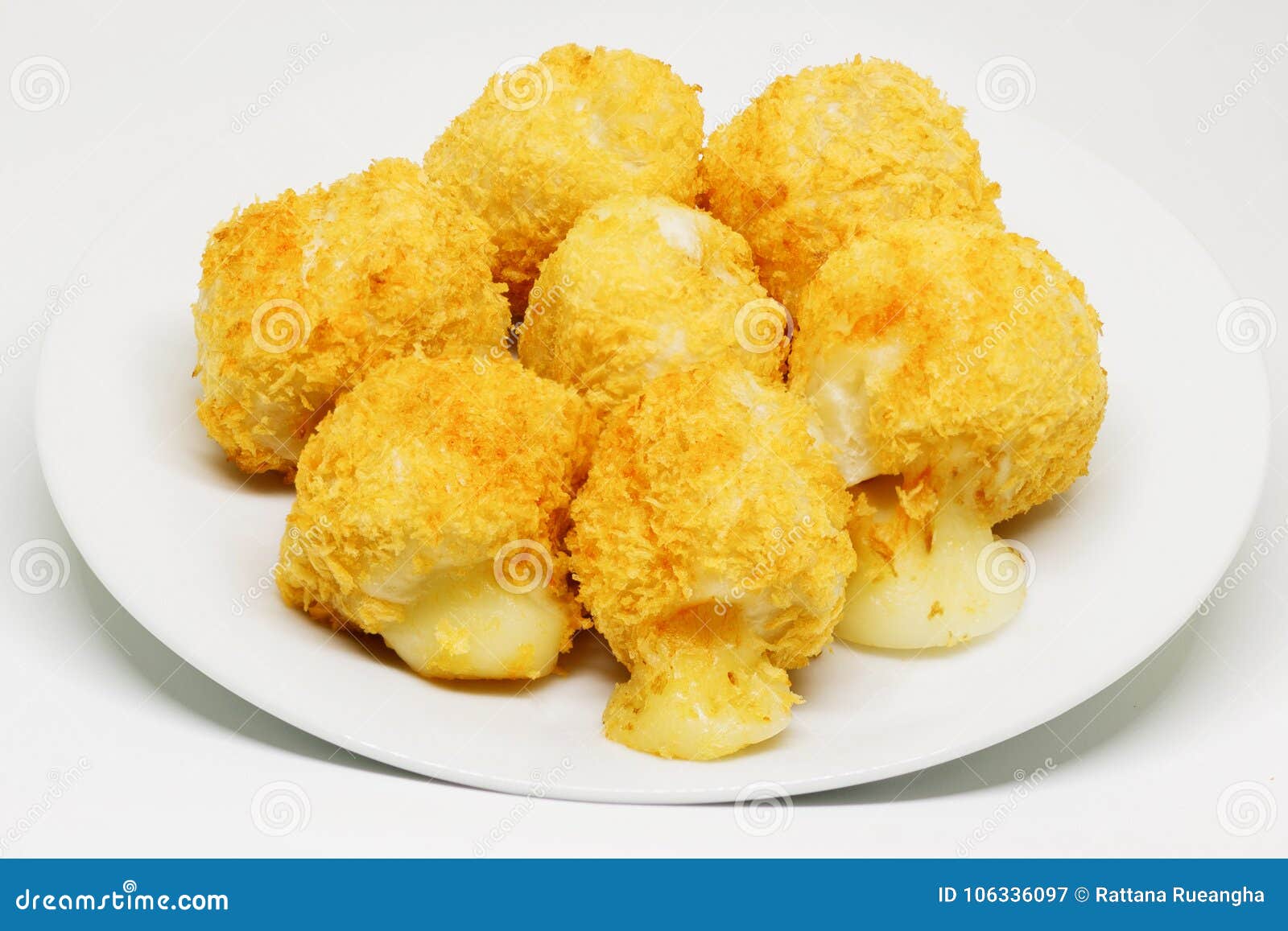 Fried Cheese Balls Cheese Breaded and Deep Fried on White Dish. Stock