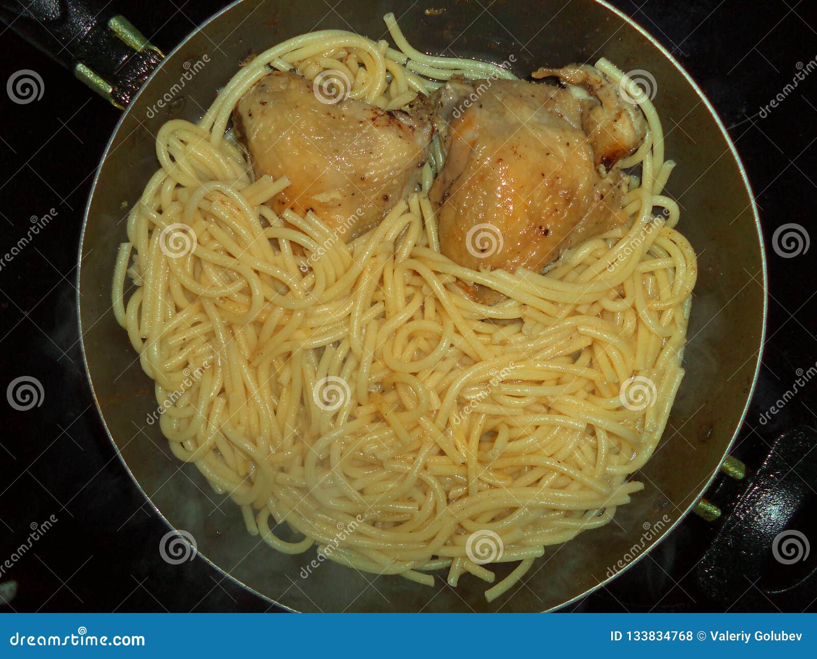 Fried Chicken Legs with Pasta in a Pan Stock Photo - Image of dinner
