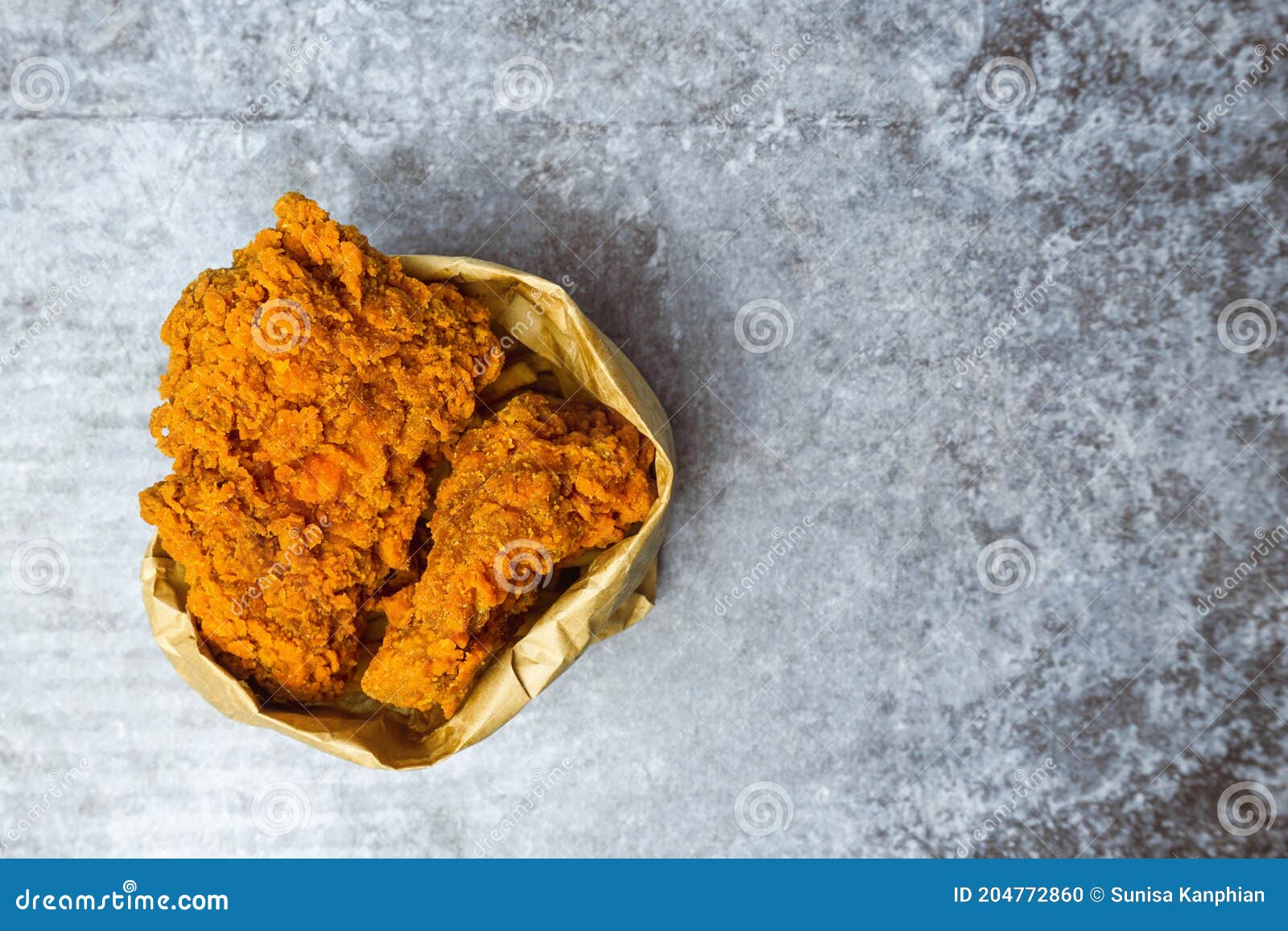 Fried Chicken in Paper Bag on Gray Concrete Table Stock Photo Image