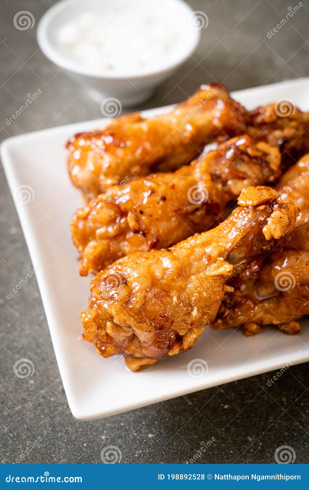 Fried chicken with sauce stock photo. Image of gourmet 198892528