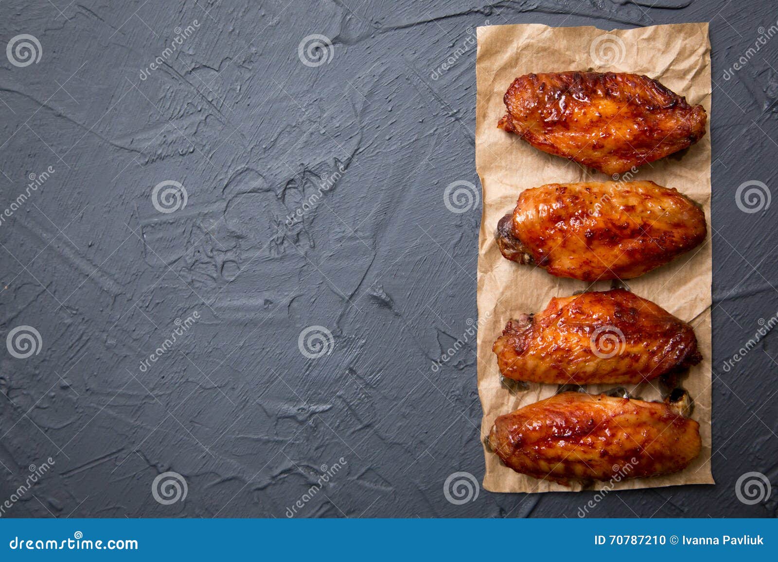 Fried Chicken Wings on a Dark Gray Background. Stock Photo Image of