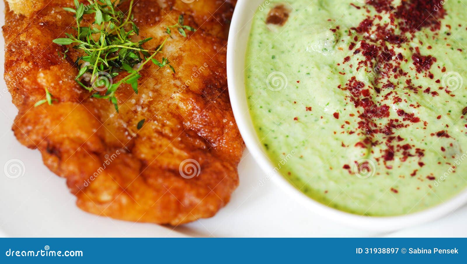 Fried Cod Fish in Batter with Cucumber and Yoghurt Dip, Detail Stock