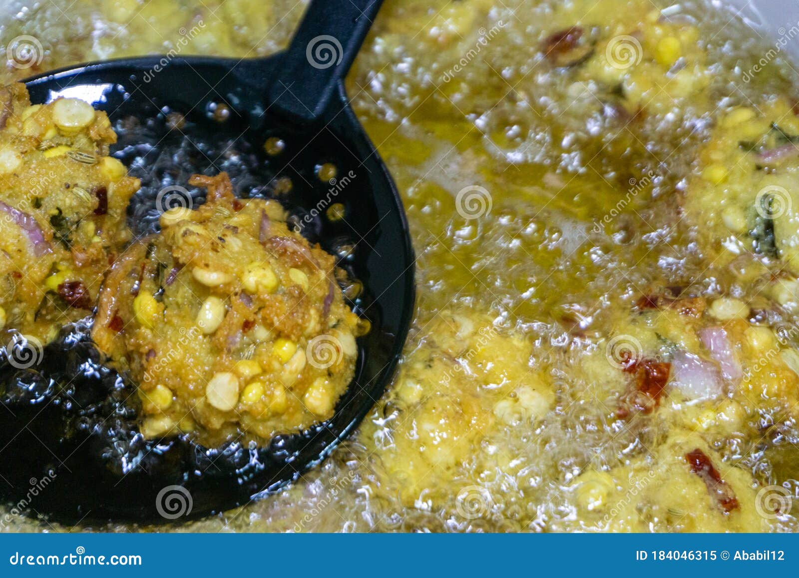 Fried Cook Of Batate Vade, Batate Vadey, Fried Dhal Beans 