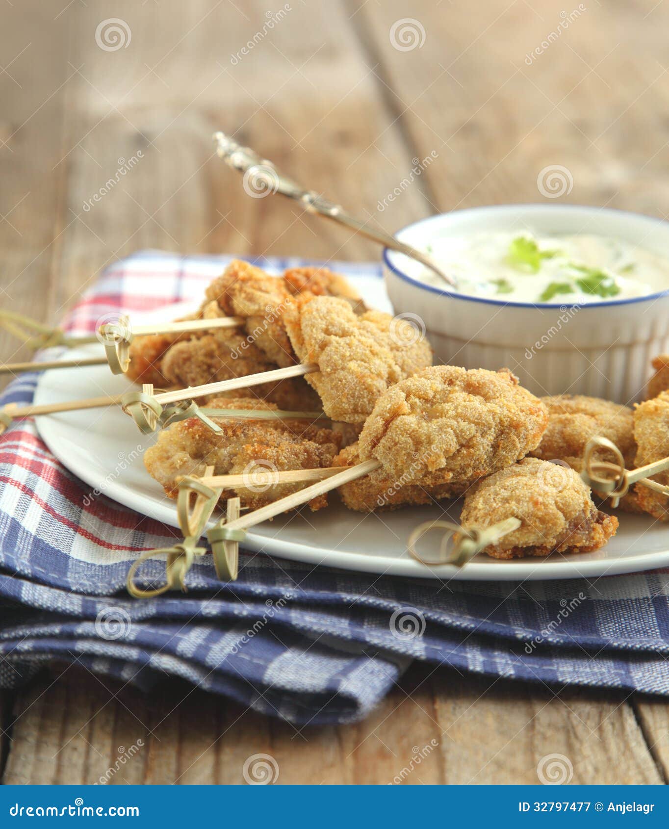 Fried Cornmealcrusted Chicken Bites with Yogurt Herb Dressing Stock