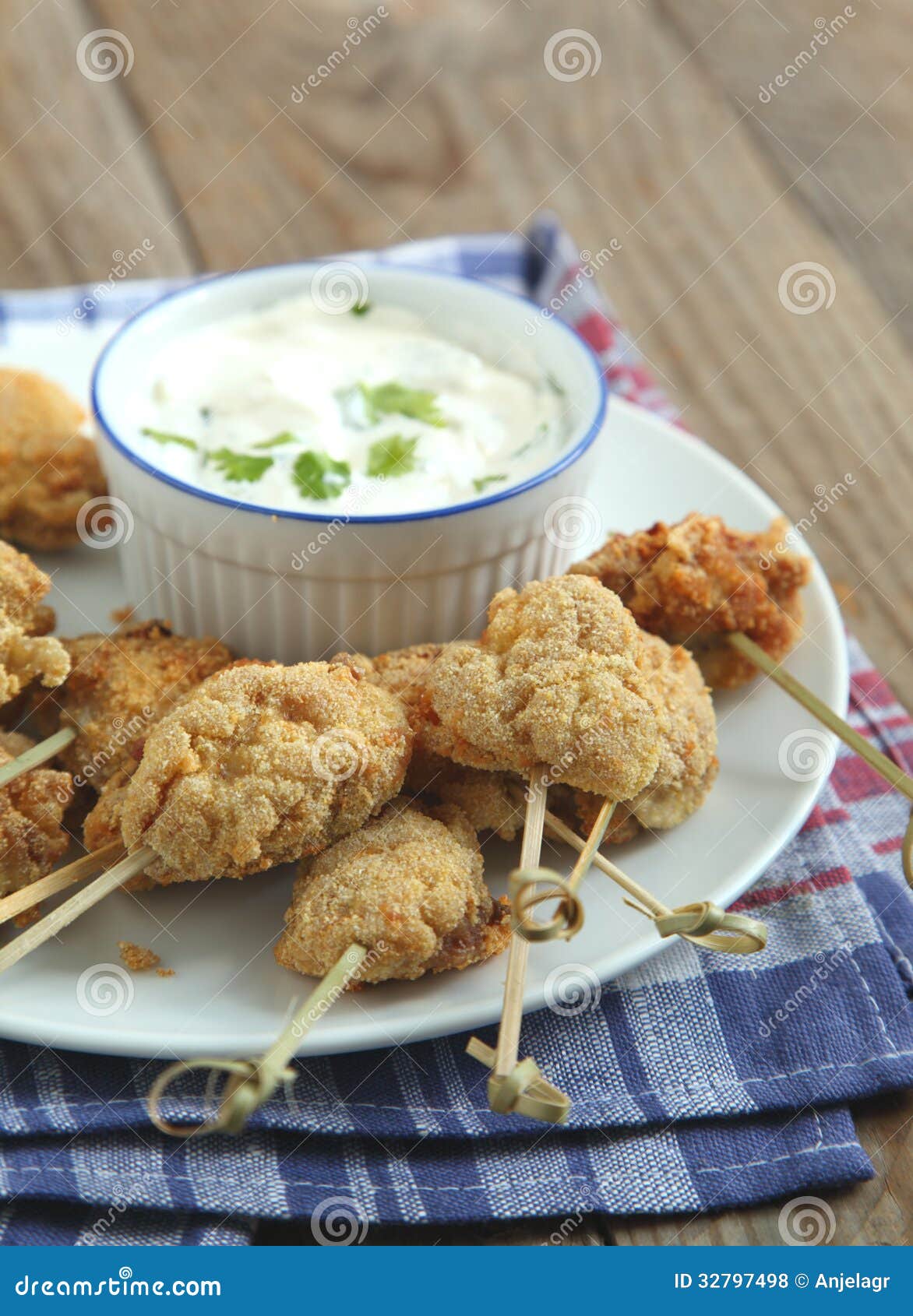 Fried Cornmealcrusted Chicken Bites with Yogurt Herb Dressing Stock
