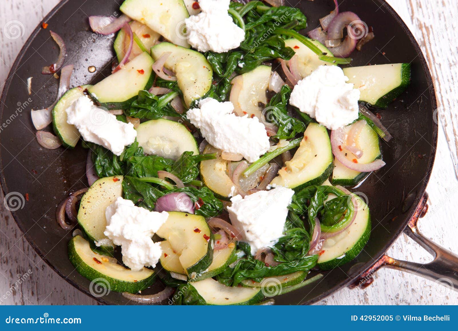 Fried Courgettes, Red Onions, Dried Chili and Ricotta Cheese Stock