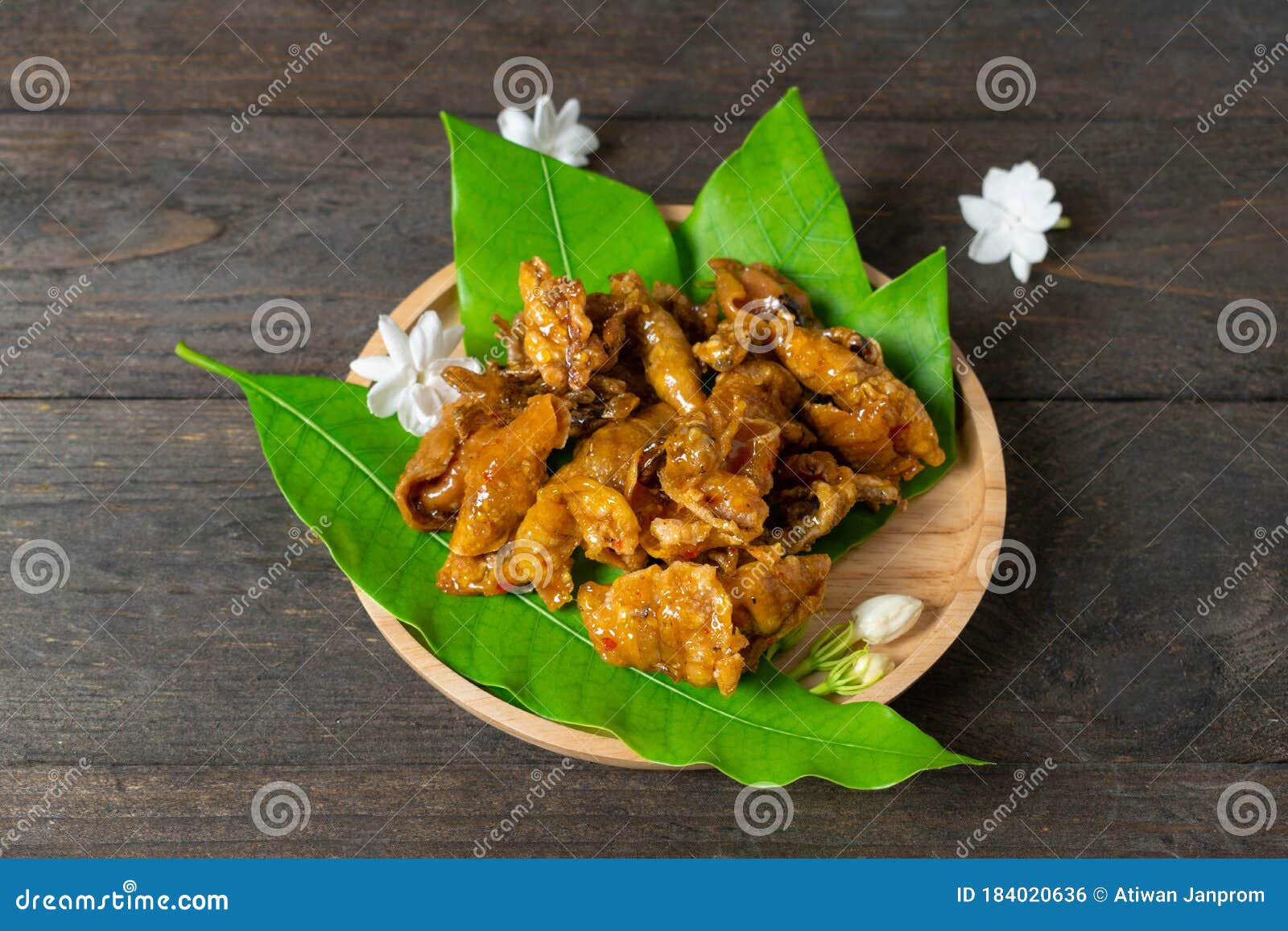 Fried Dried Squid on Mango Leaves in Wooden Dish Stock Photo Image of