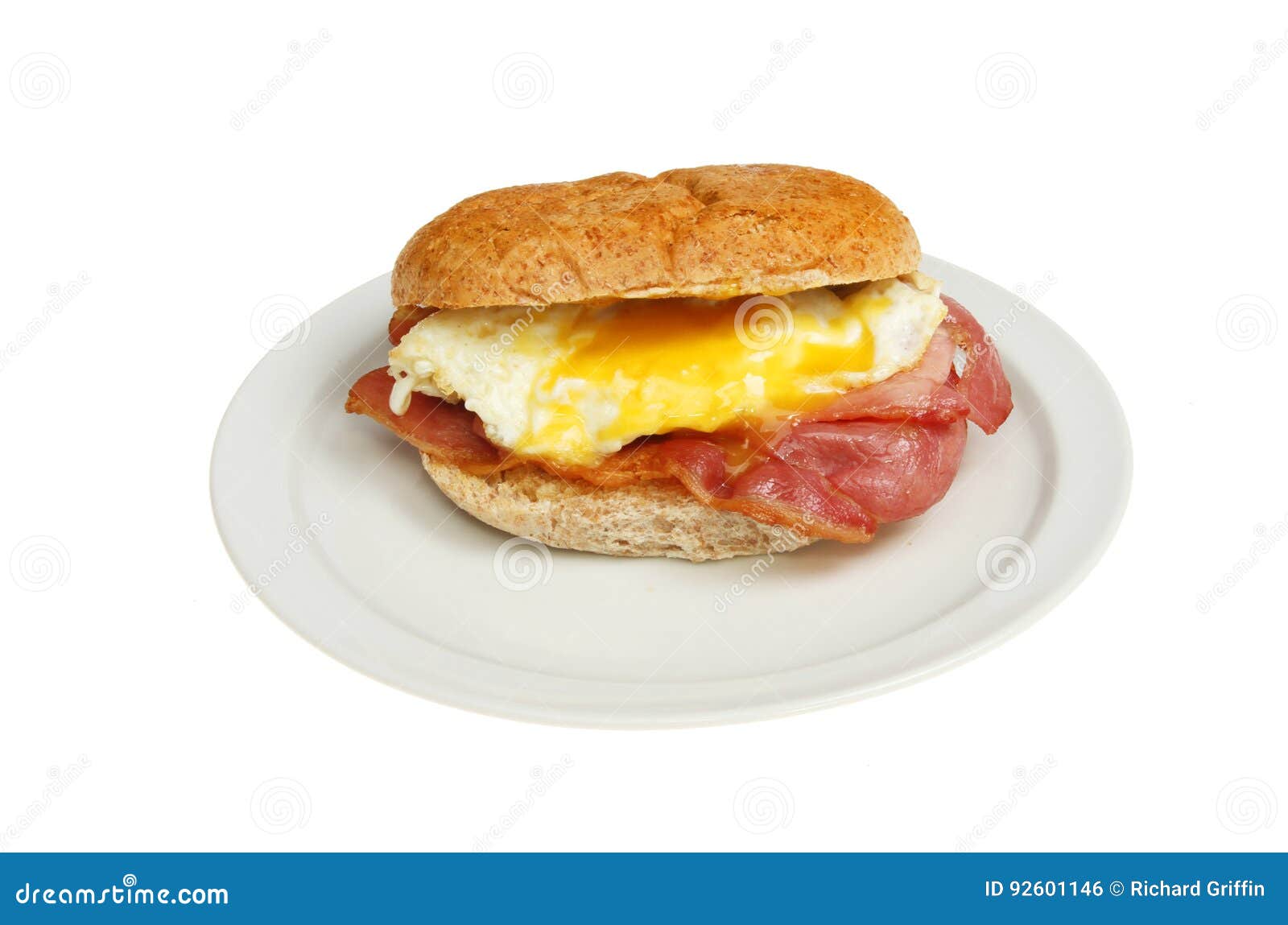 Fried egg and bacon bap stock photo. Image of wholemeal 92601146