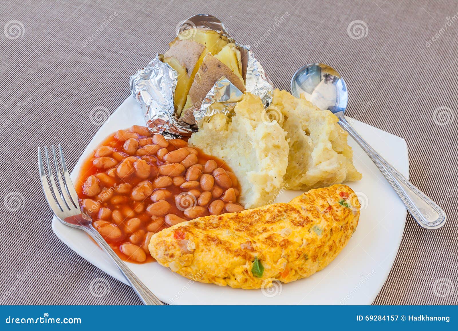 Fried Egg, Baked Beans and a Potato Stock Image Image of tomato, meal