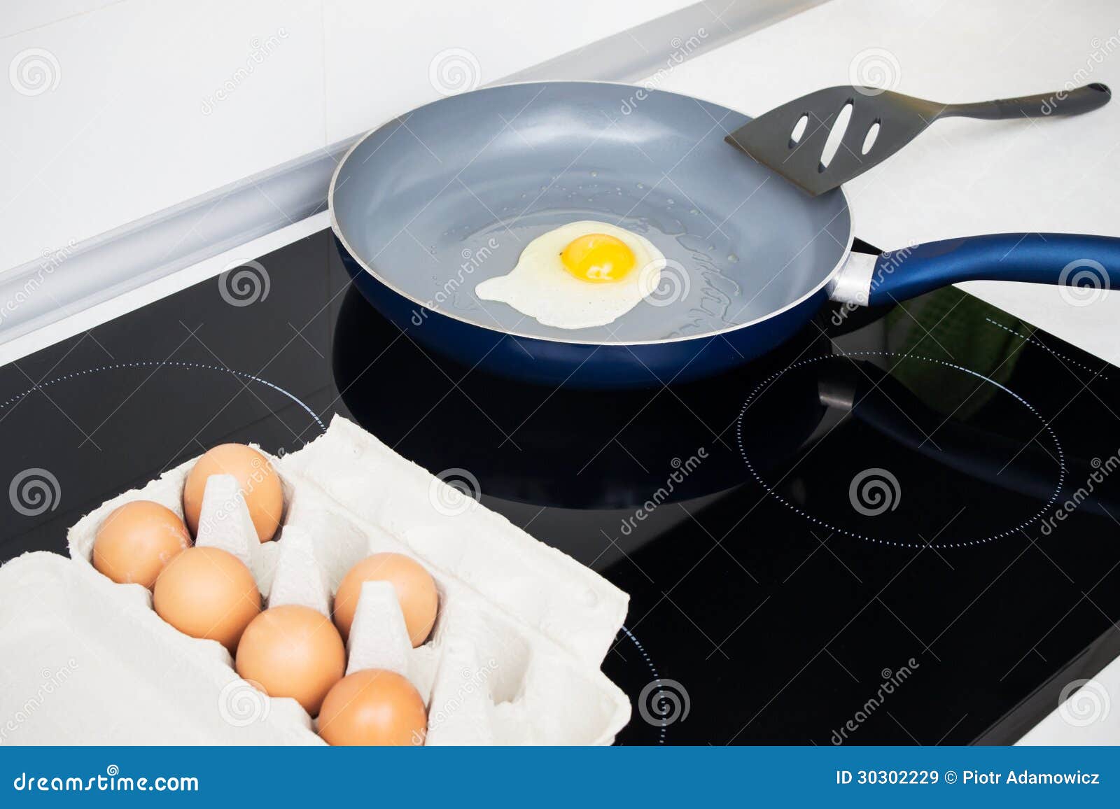 Fried egg in a frying pan stock image. Image of produce 30302229