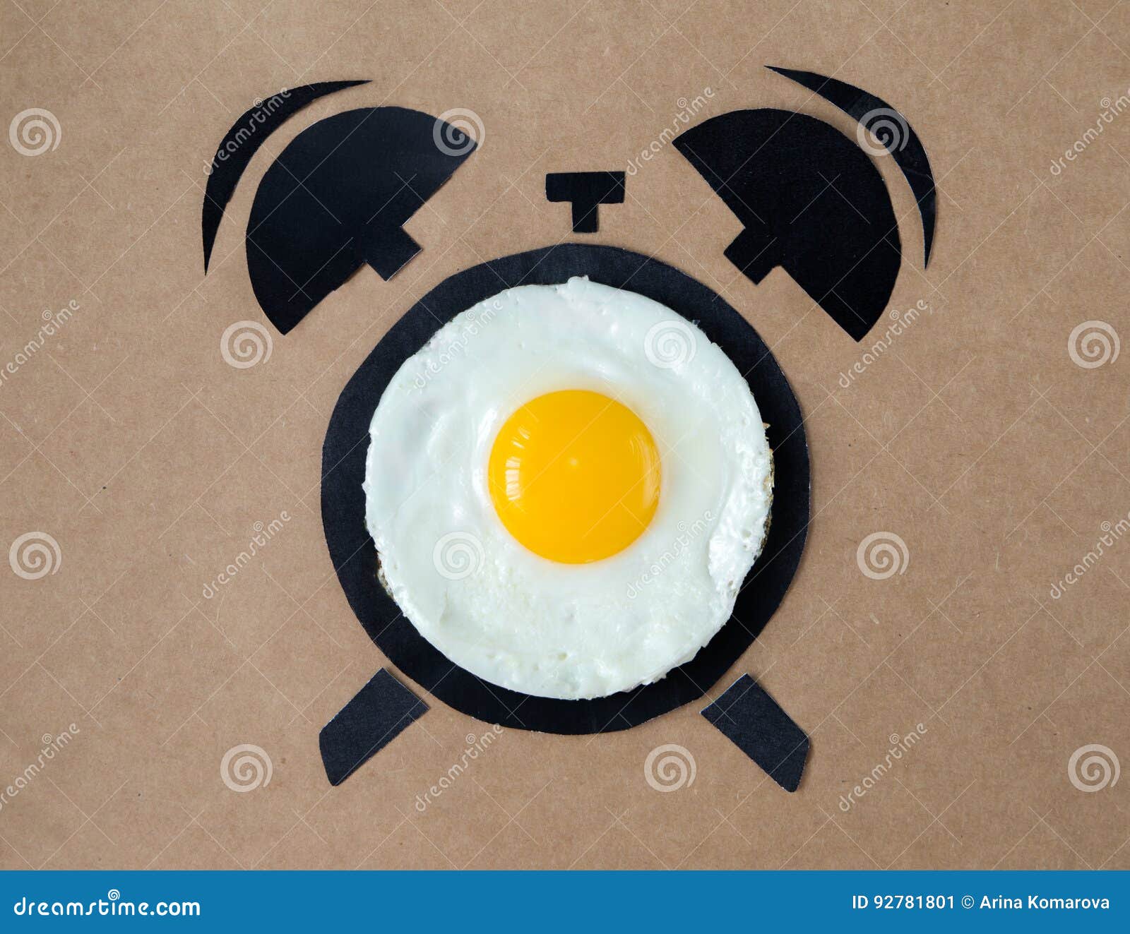 fried egg in  of alarm clock, breakfast time concept