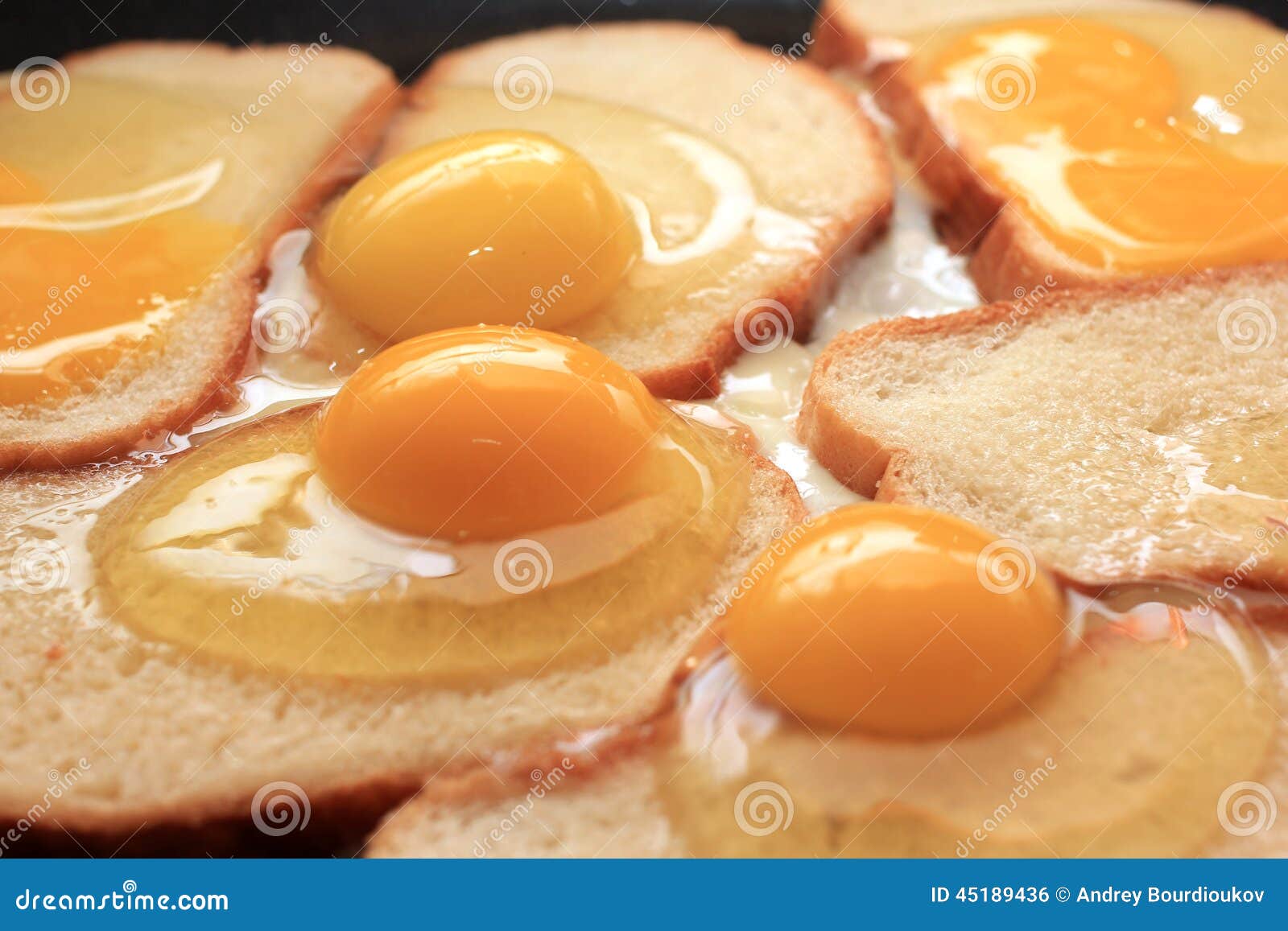 Fried eggs and fried bread stock photo. Image of cooking 45189436