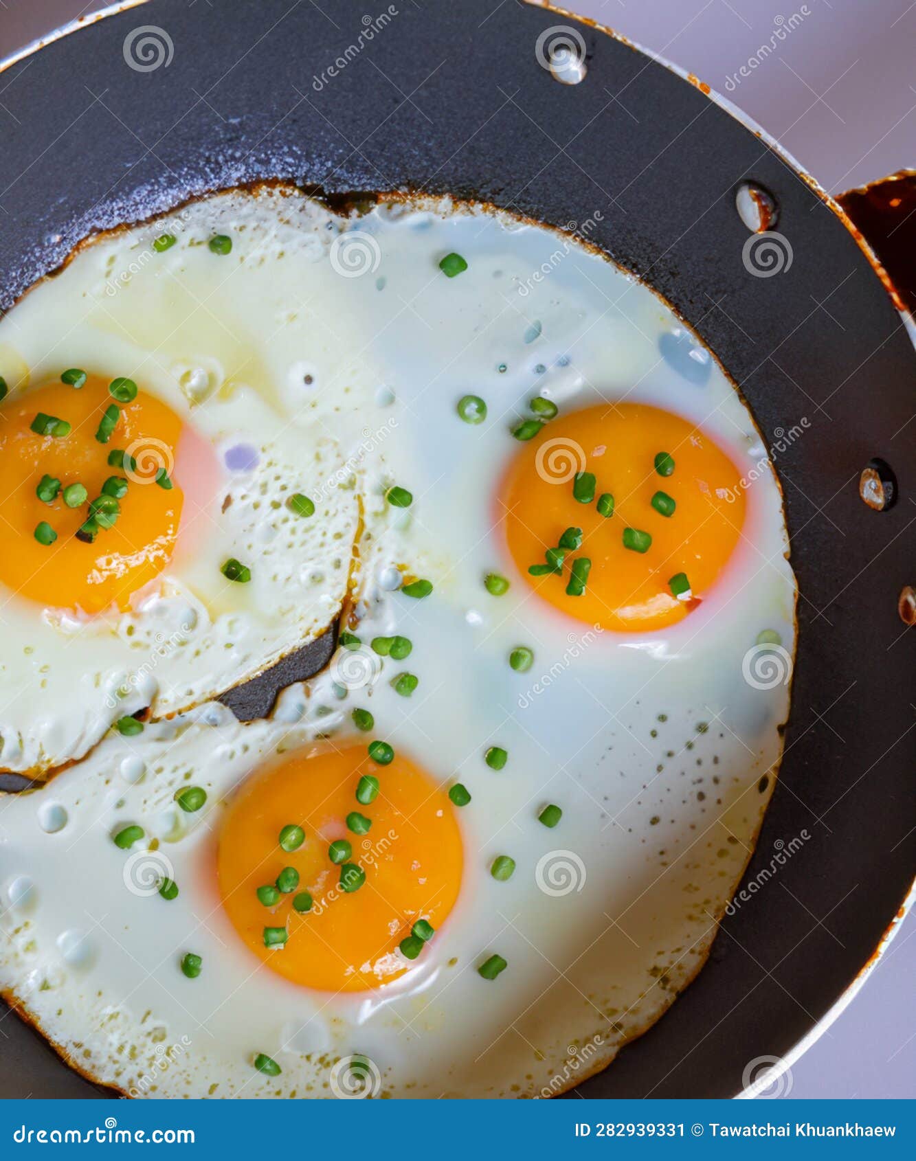 Fried Eggs in a Frying Pan for Breakfast Stock Illustration