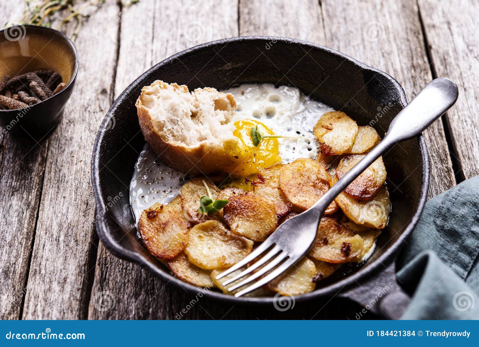 Fried Eggs and Potatoes in Cast Iron Skillet Stock Photo Image of