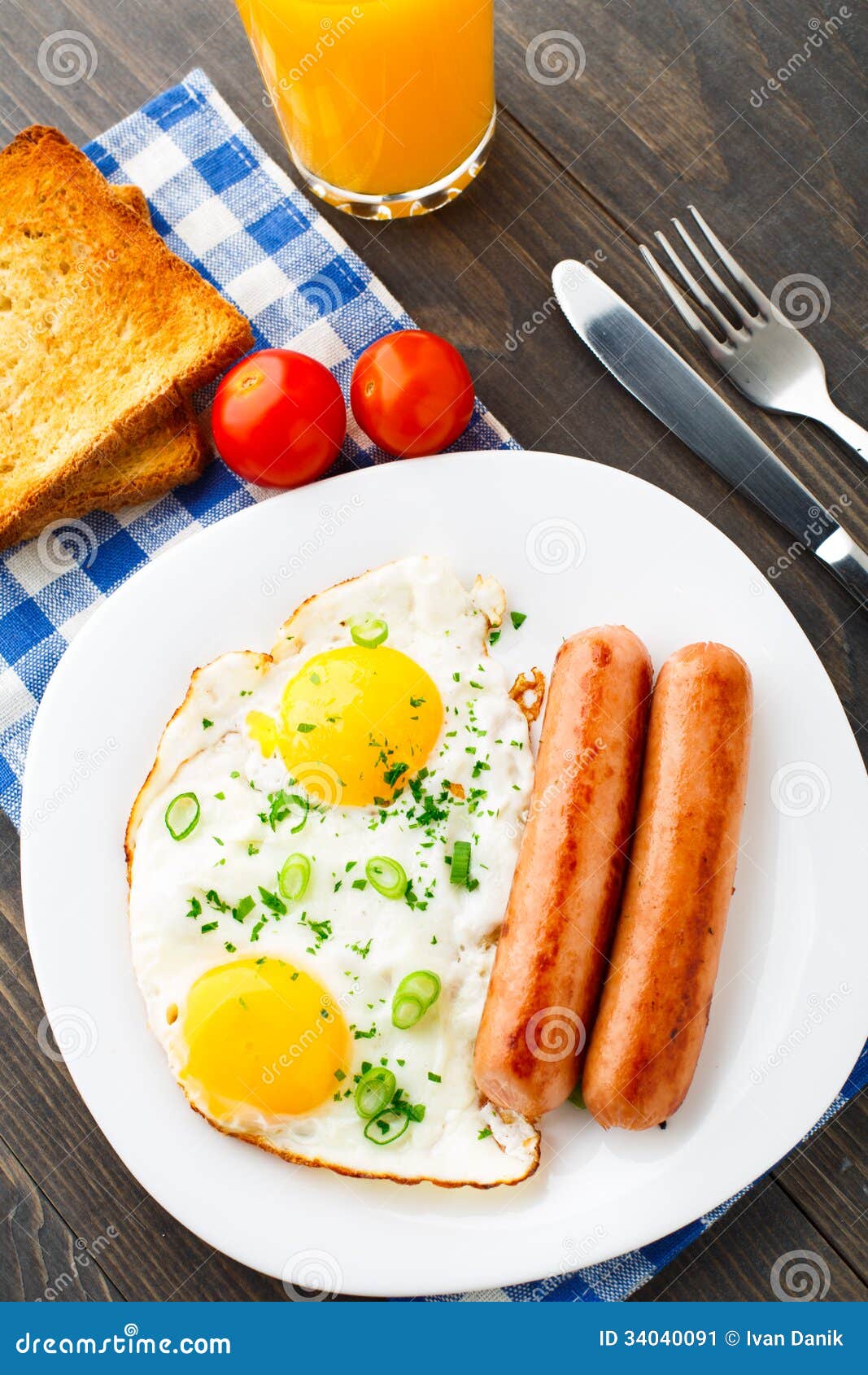Fried eggs with sausages. stock image. Image of nutrition 34040091