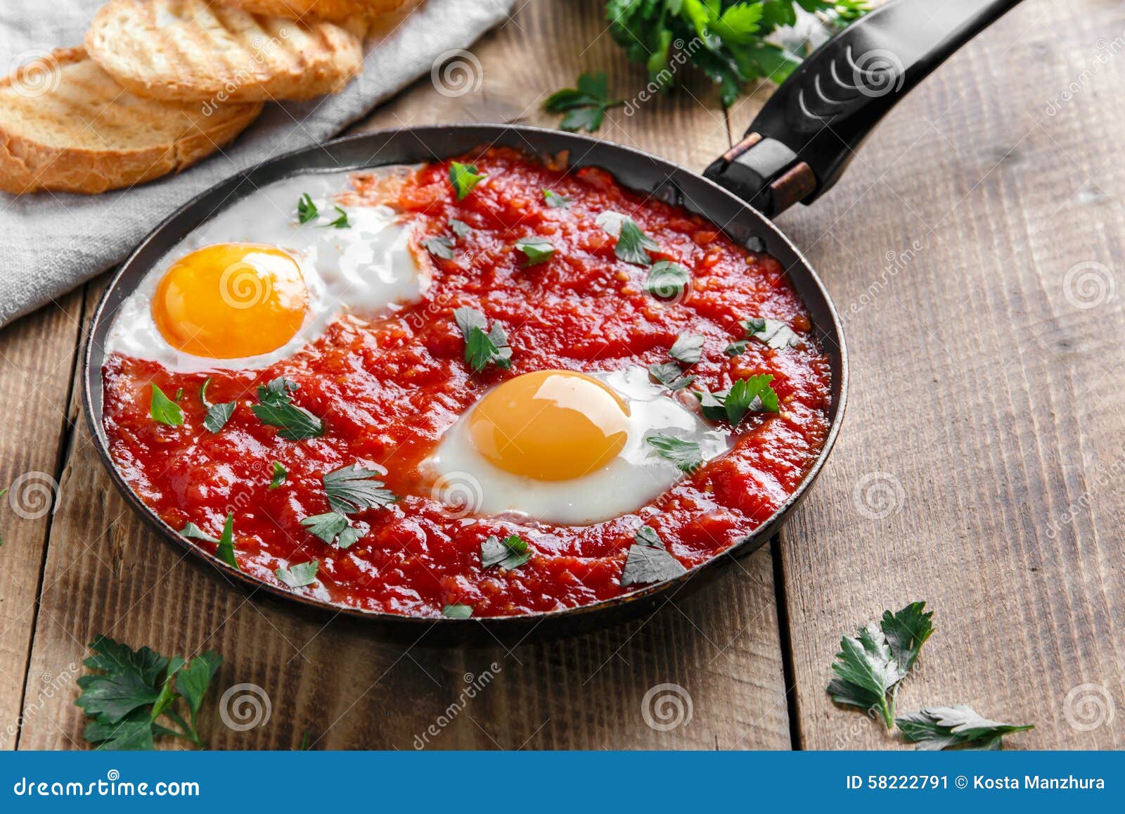 Fried eggs in tomato sauce stock image. Image of healthy 58222791