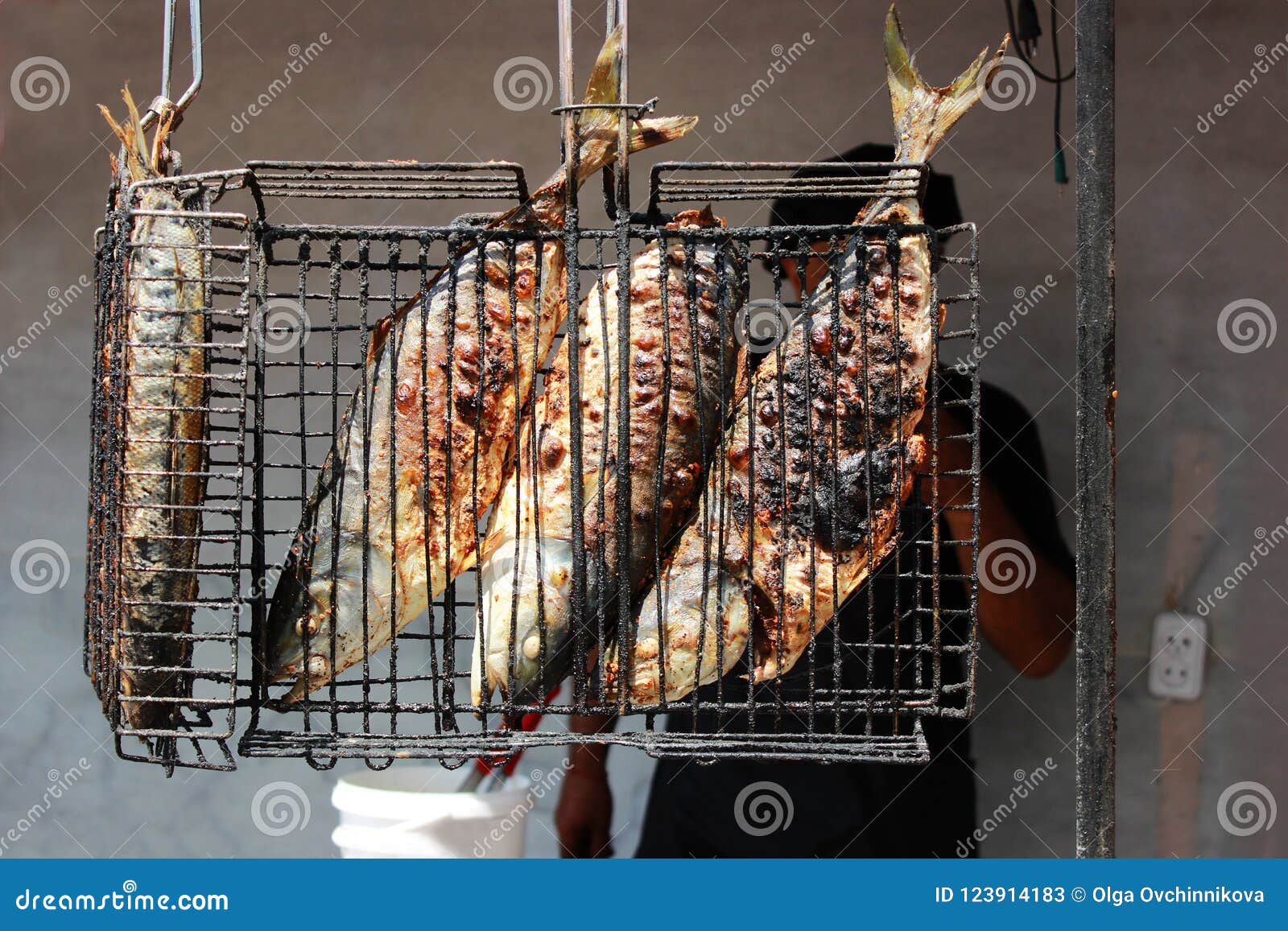 Fried Fish Cooked Entirely On An Open Fire On The Embankment Near The Black Sea On The Grill ...