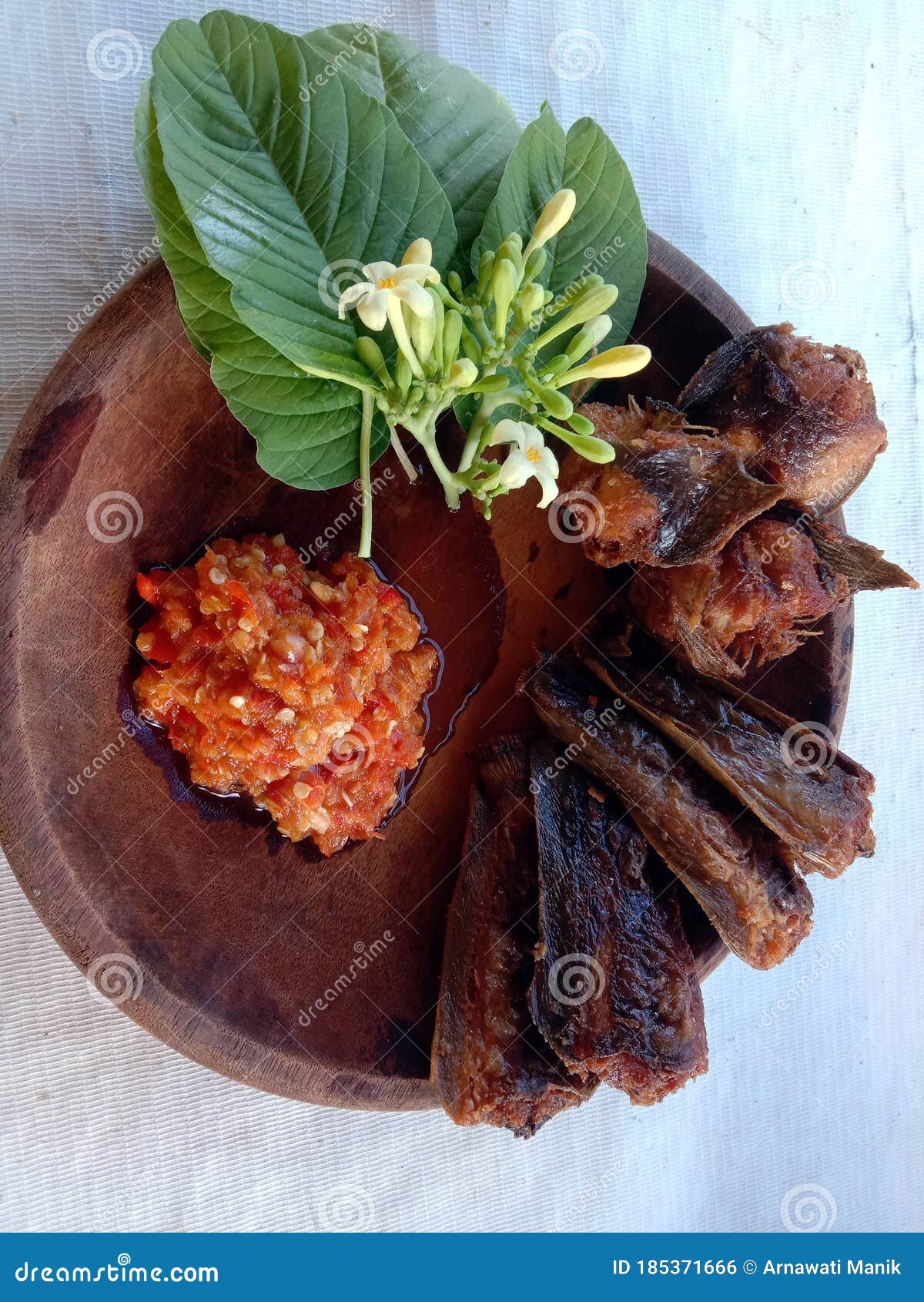 Fried fish with hot sauce stock photo. Image of meal 185371666